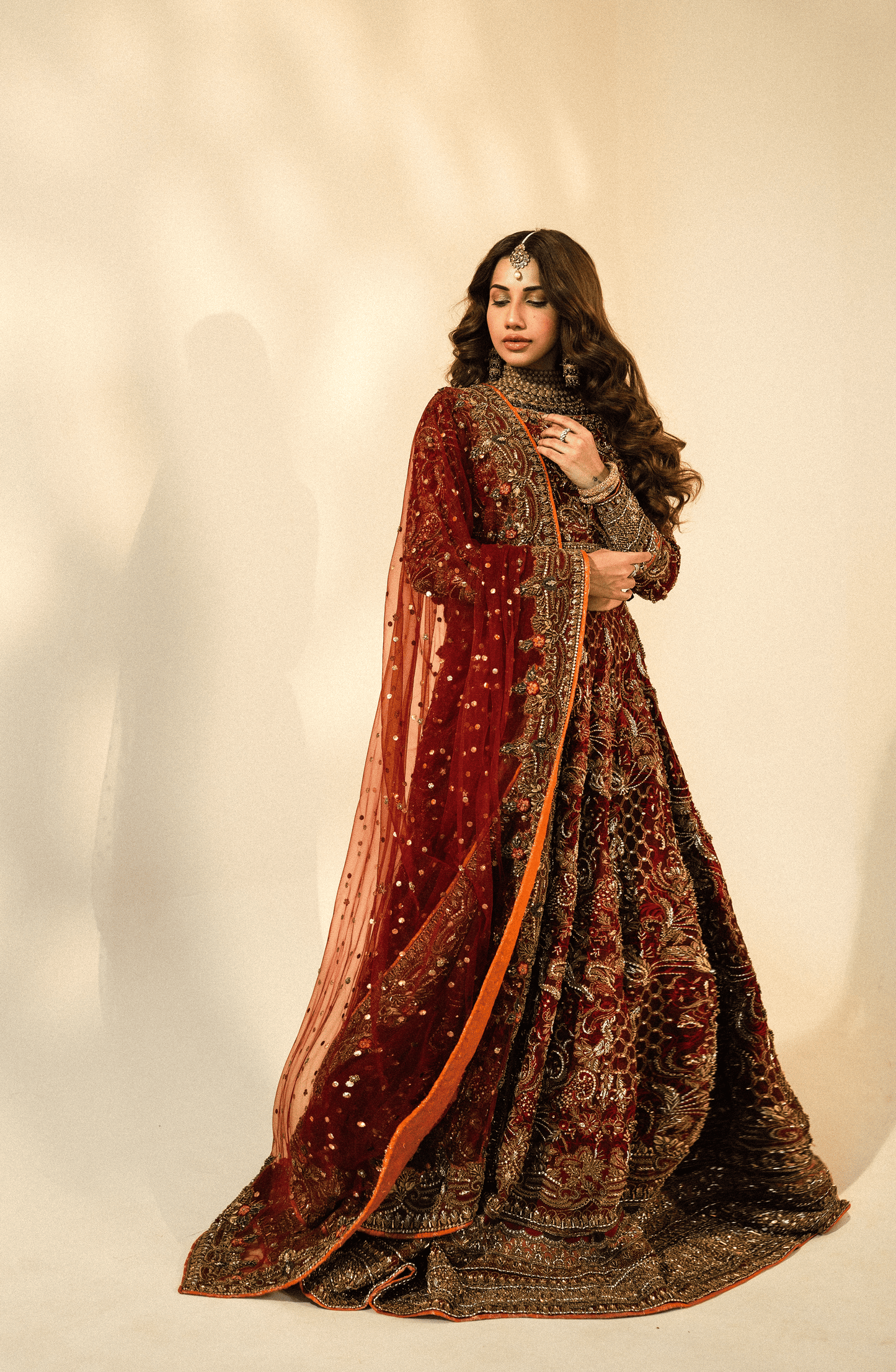 Nazakat - Bridal Embroidered Maroon Lehnga Choli with a Net Dupatta
