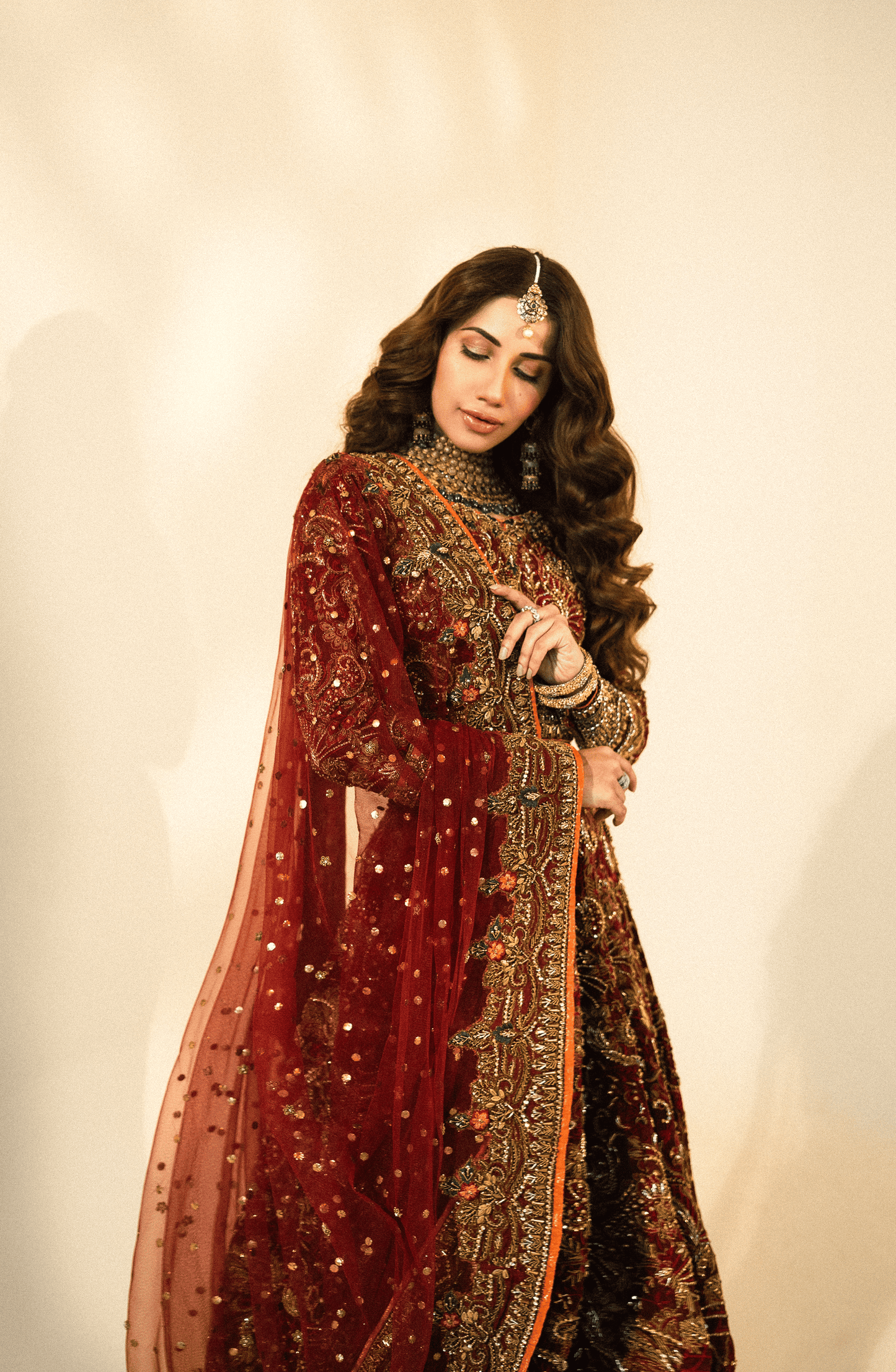 Nazakat - Bridal Embroidered Maroon Lehnga Choli with a Net Dupatta