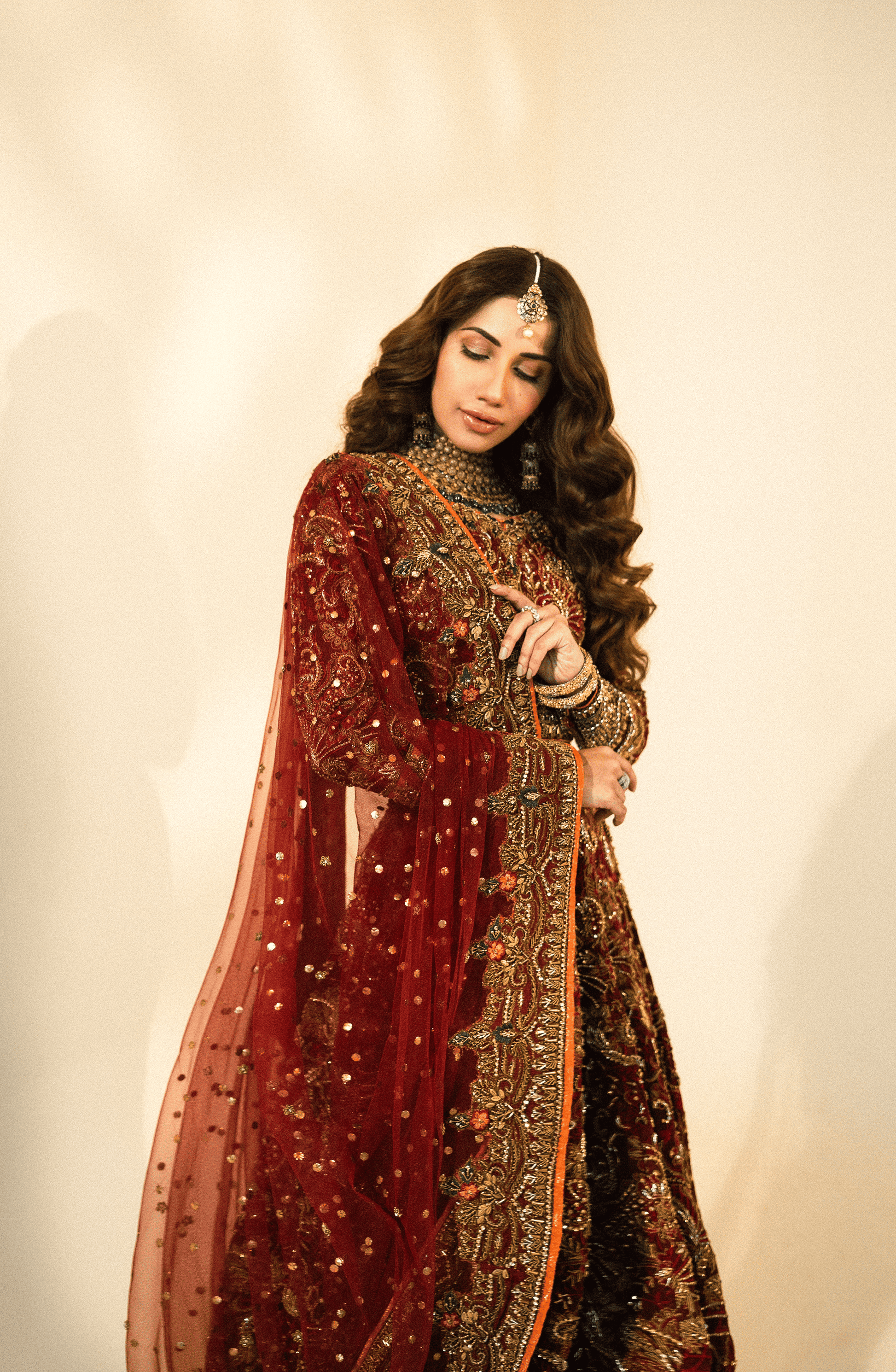 Nazakat - Bridal Embroidered Maroon Lehnga Choli with a Net Dupatta