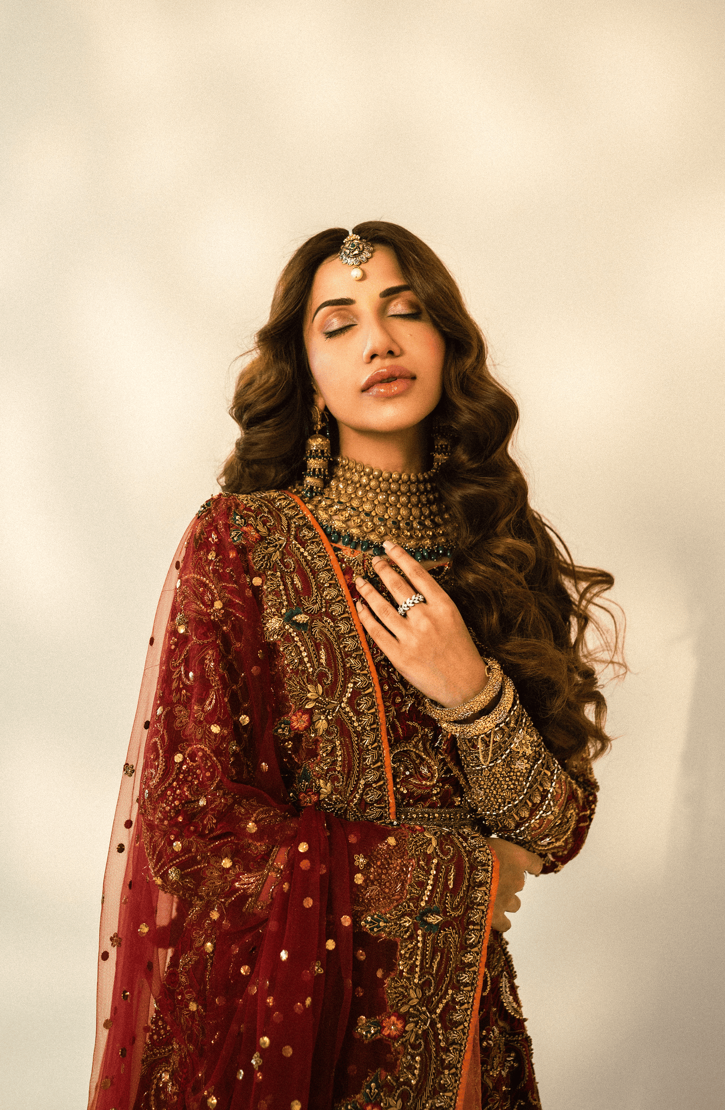 Nazakat - Bridal Embroidered Maroon Lehnga Choli with a Net Dupatta
