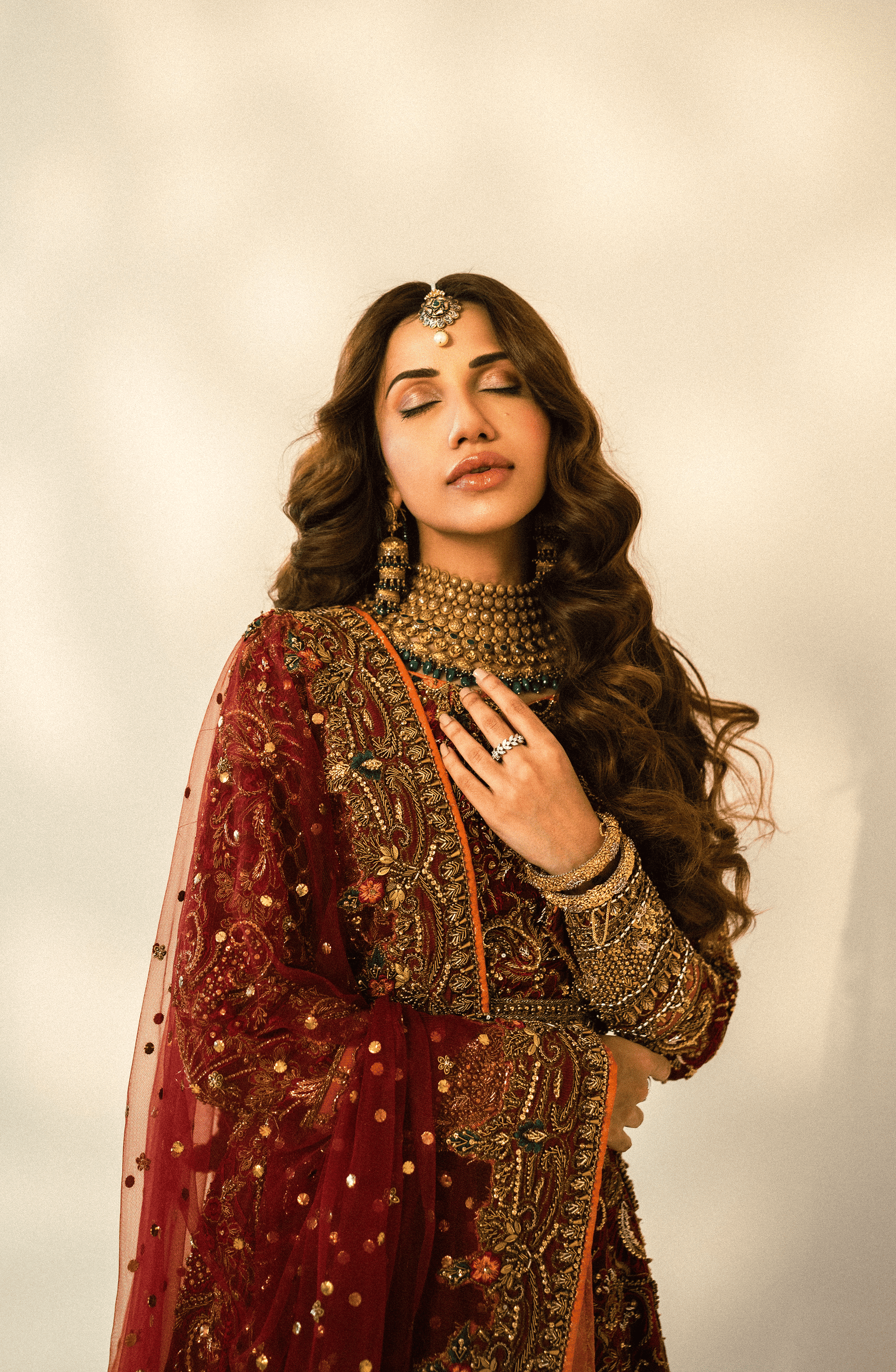 Nazakat - Bridal Embroidered Maroon Lehnga Choli with a Net Dupatta