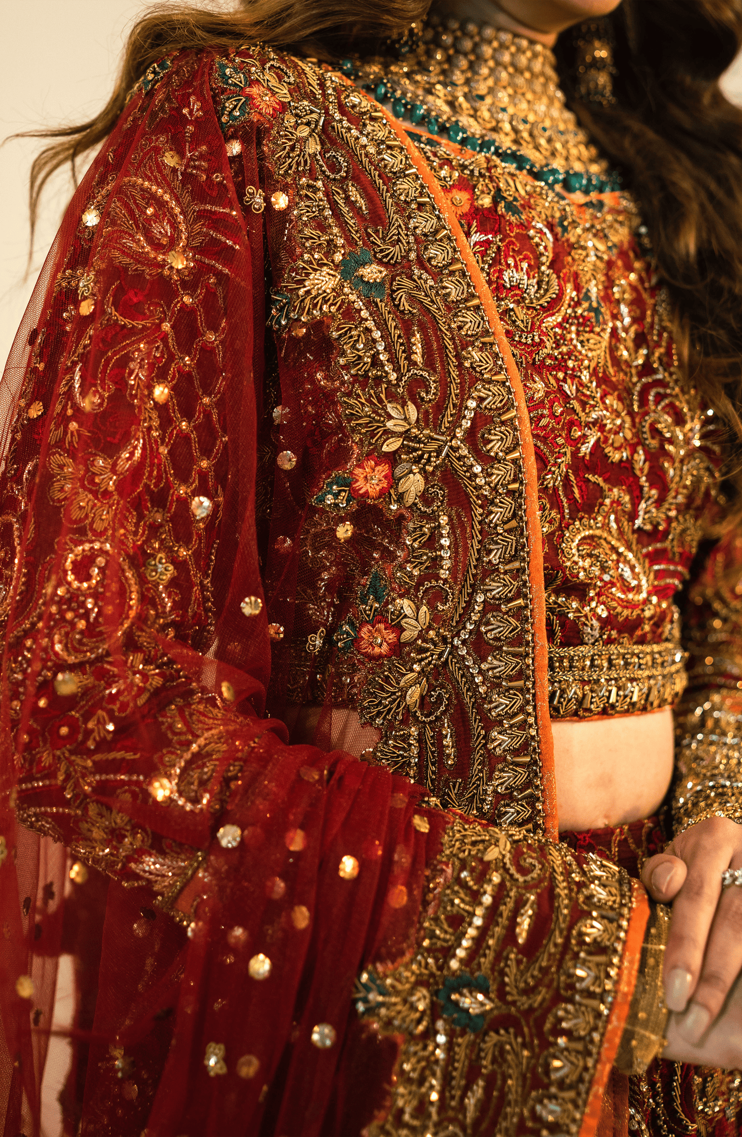 Nazakat - Bridal Embroidered Maroon Lehnga Choli with a Net Dupatta