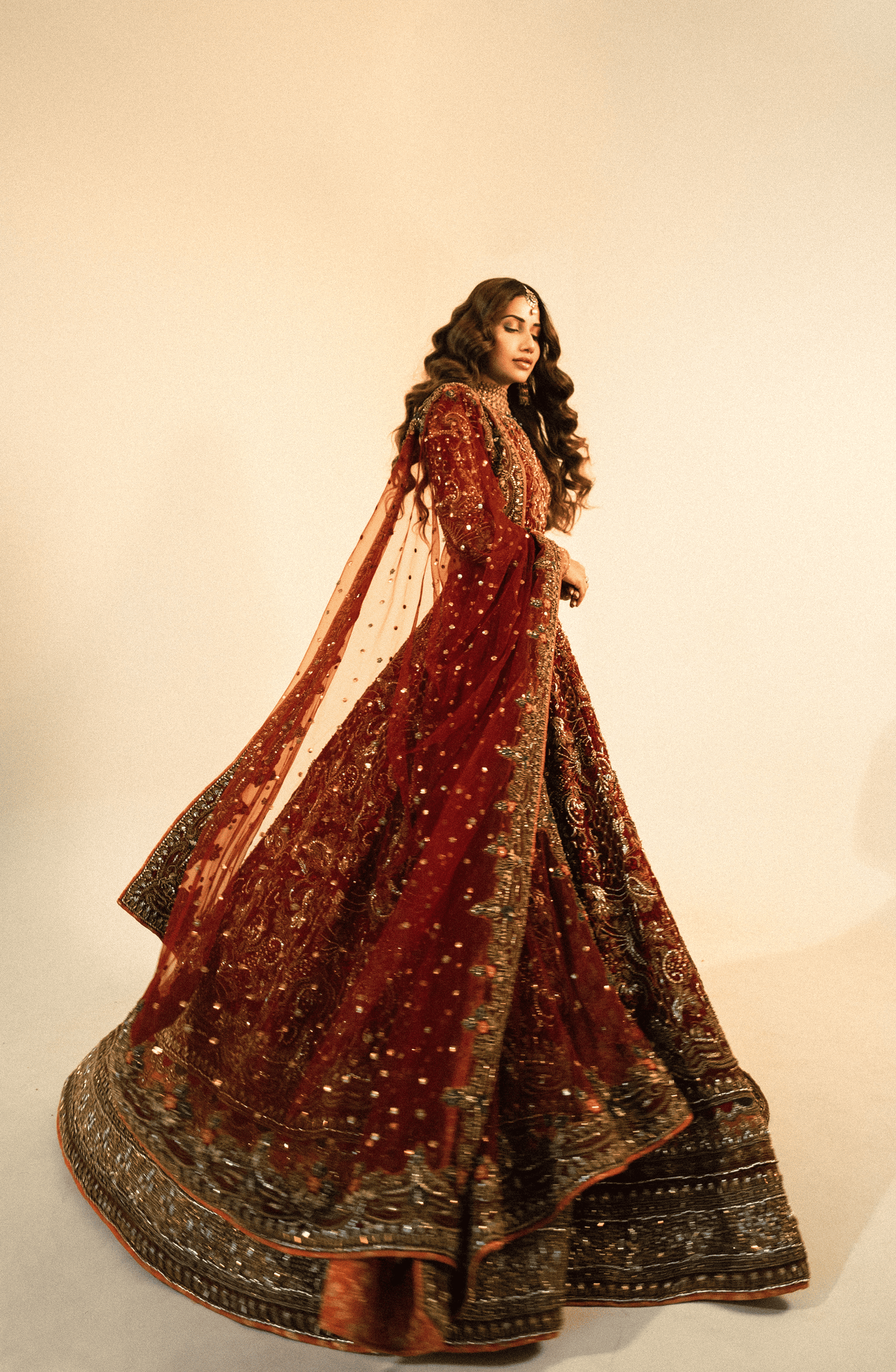 Nazakat - Bridal Embroidered Maroon Lehnga Choli with a Net Dupatta