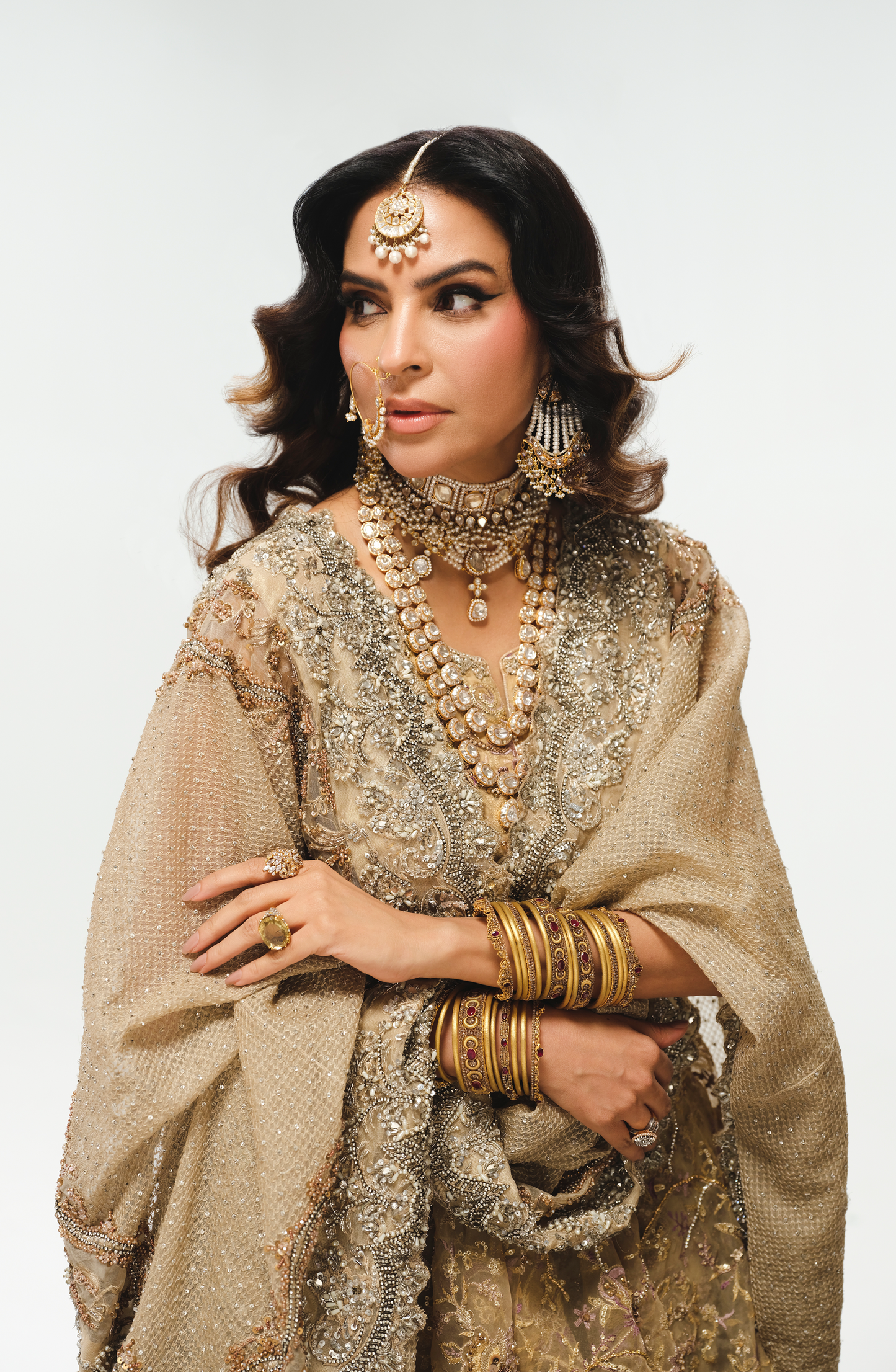 Fouzia Aman wearing farshi gharara, peplum, and dupatta.