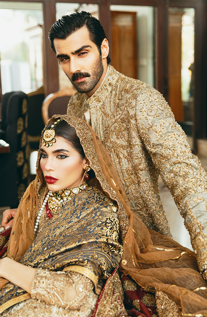 Embroidered Beige Kurta, Paired with a fully embellished Gold Sherwani