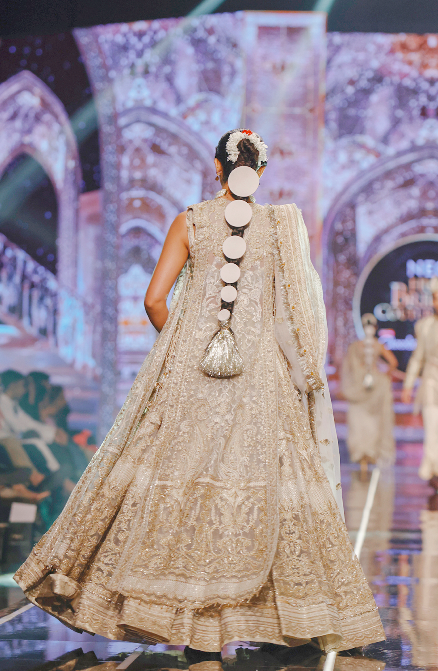 designer bridal lahenga from Pakistan-Traditional ethnic look in BCW-01 net lehenga choli with tabard.