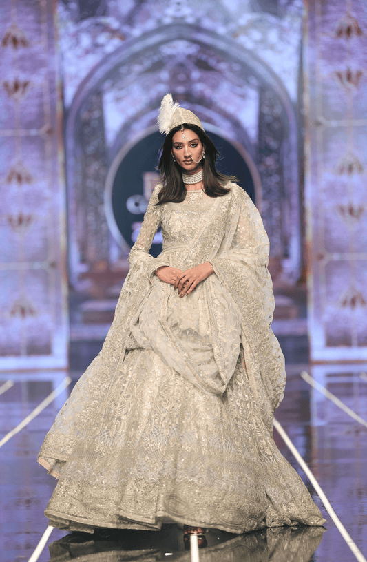 Traditional ethnic look in BCW-02 net peplum lehenga ensemble.