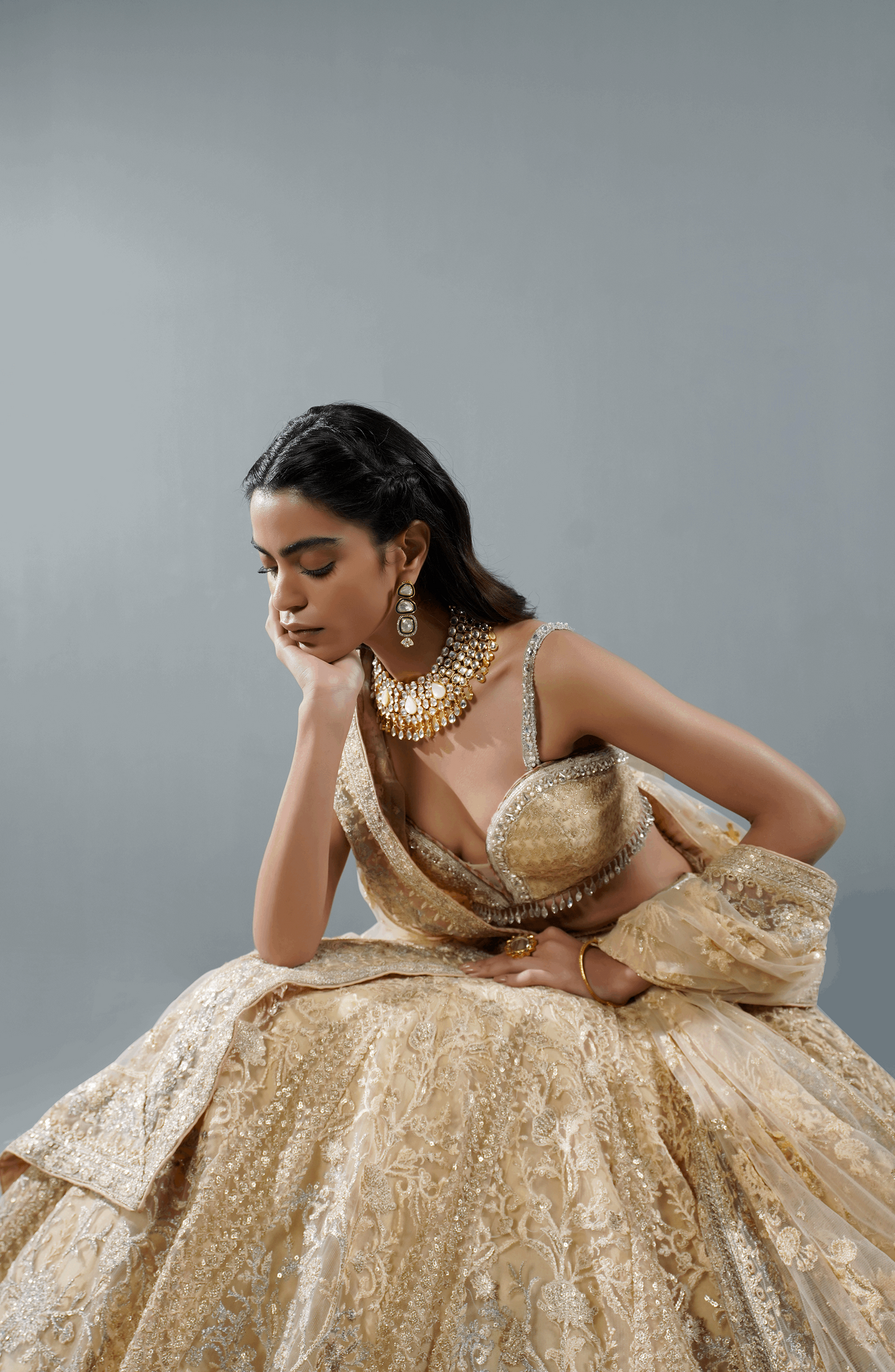 Beige Dream - Exquisite Net Lehenga Choli Outfit-Closeup view of hand embroidery on Beige Dream net lehenga choli outfit.