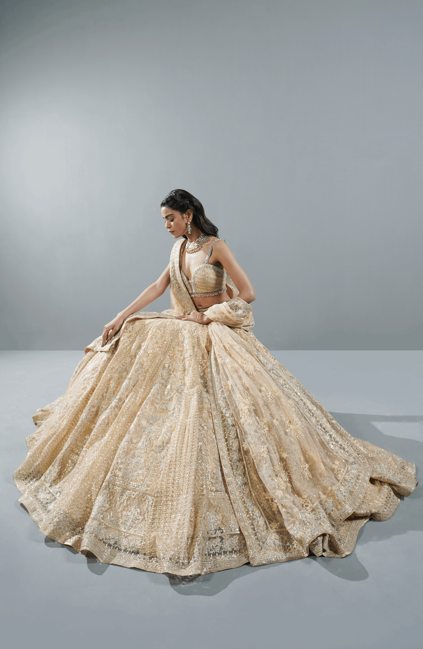 Beige Dream - Exquisite Net Lehenga Choli Outfit-Intricate embroidery details on Beige Dream lehenga choli ensemble.