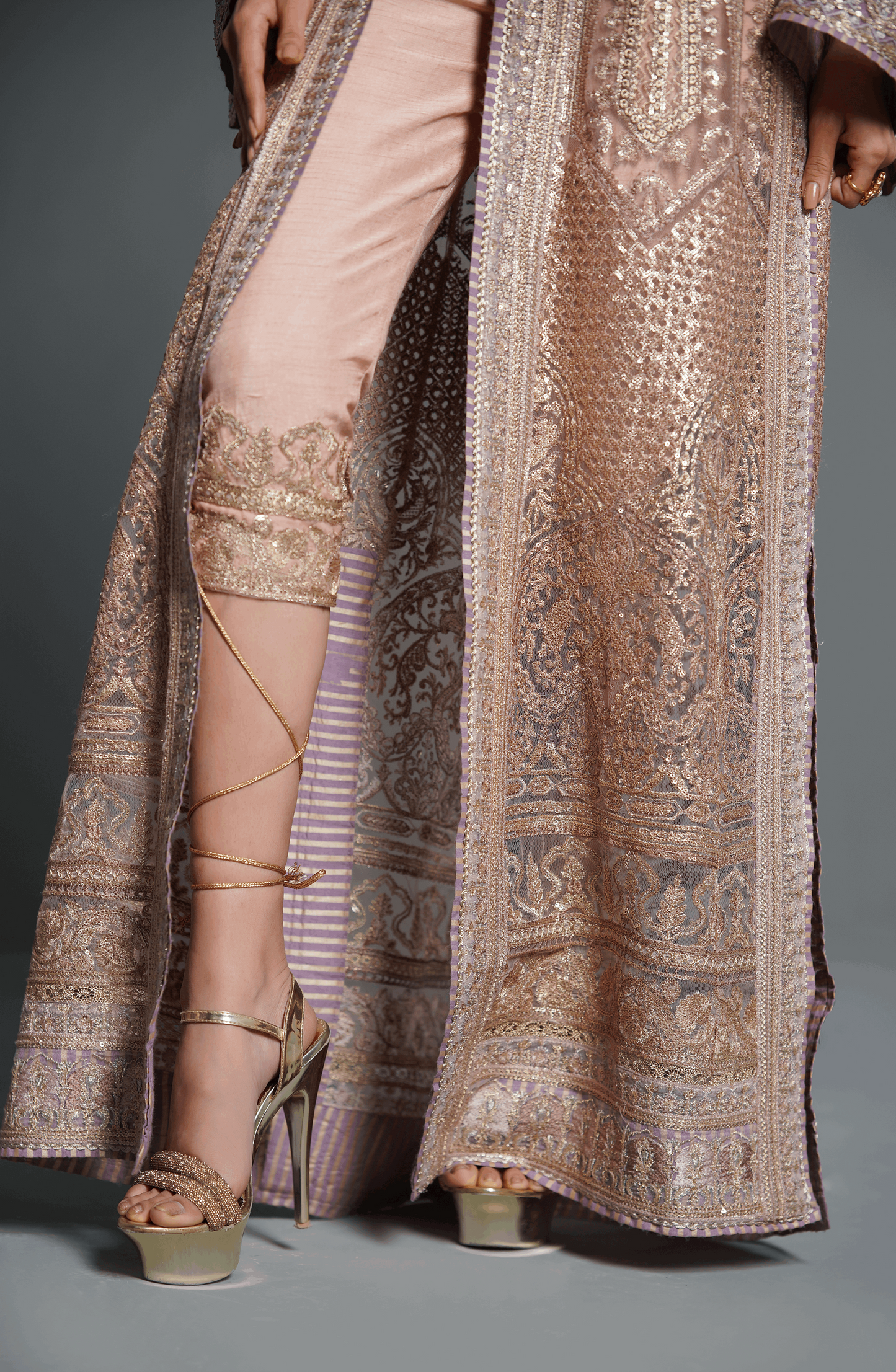 Champagne Pink - Beautiful Embroidered Ensemble-Flowing skirt flare of champagne pink ensemble with detailed embellishments.