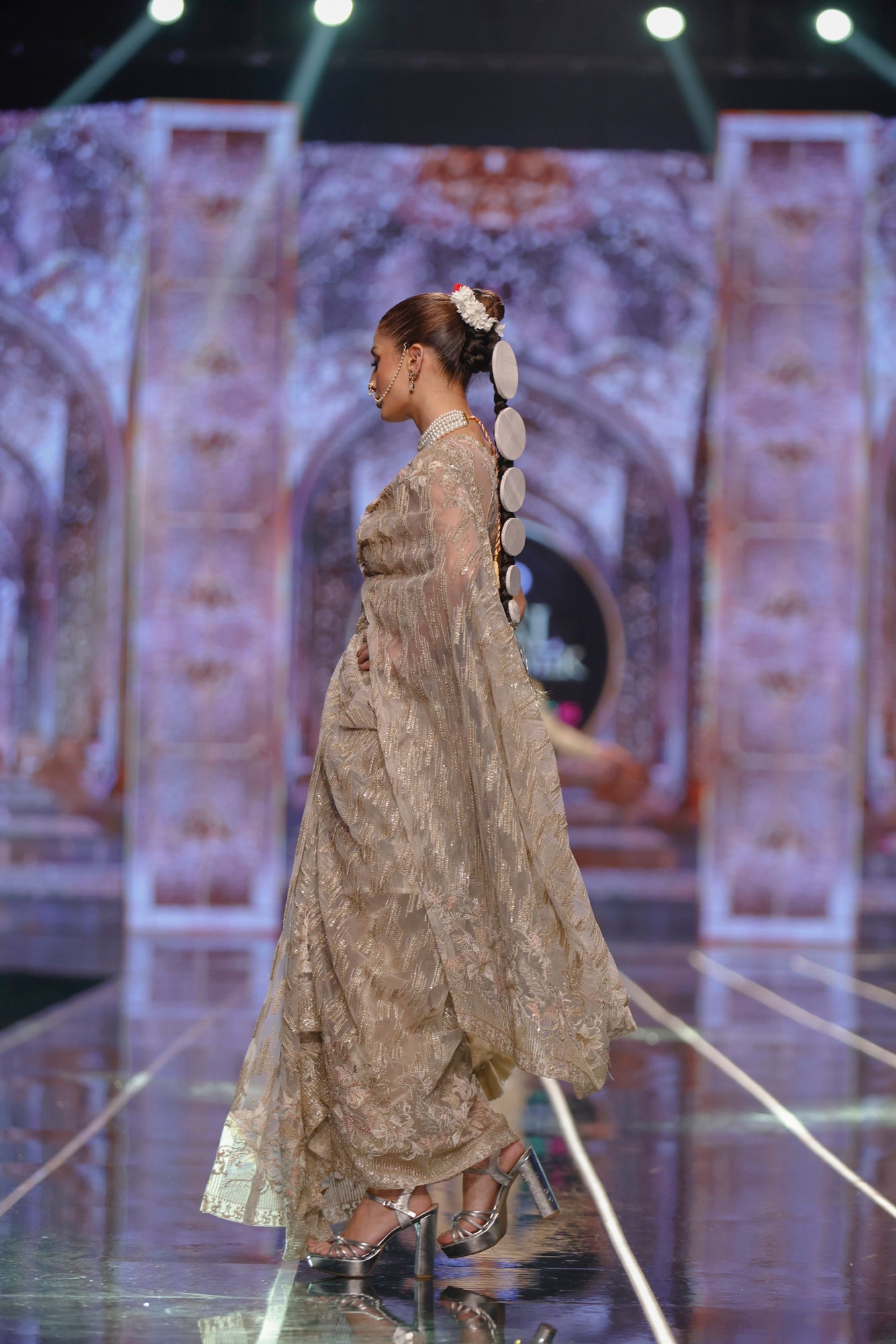 Pakistani designer bridal saree online by HSY -Model wearing contemporary stitched saree in trendy style