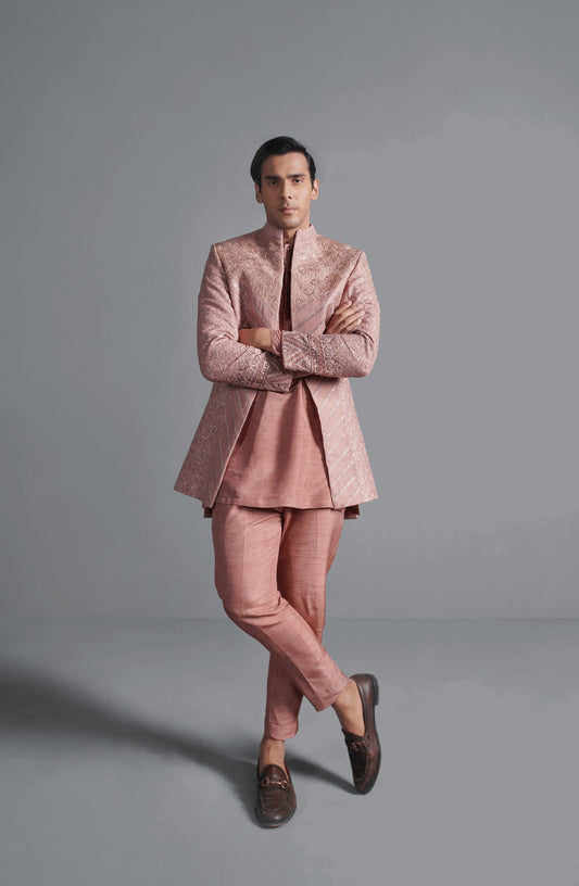 Premium groom sherwanis in unique patterns-Full outfit of coral pink cotton net short sherwani paired with matching bottoms.
