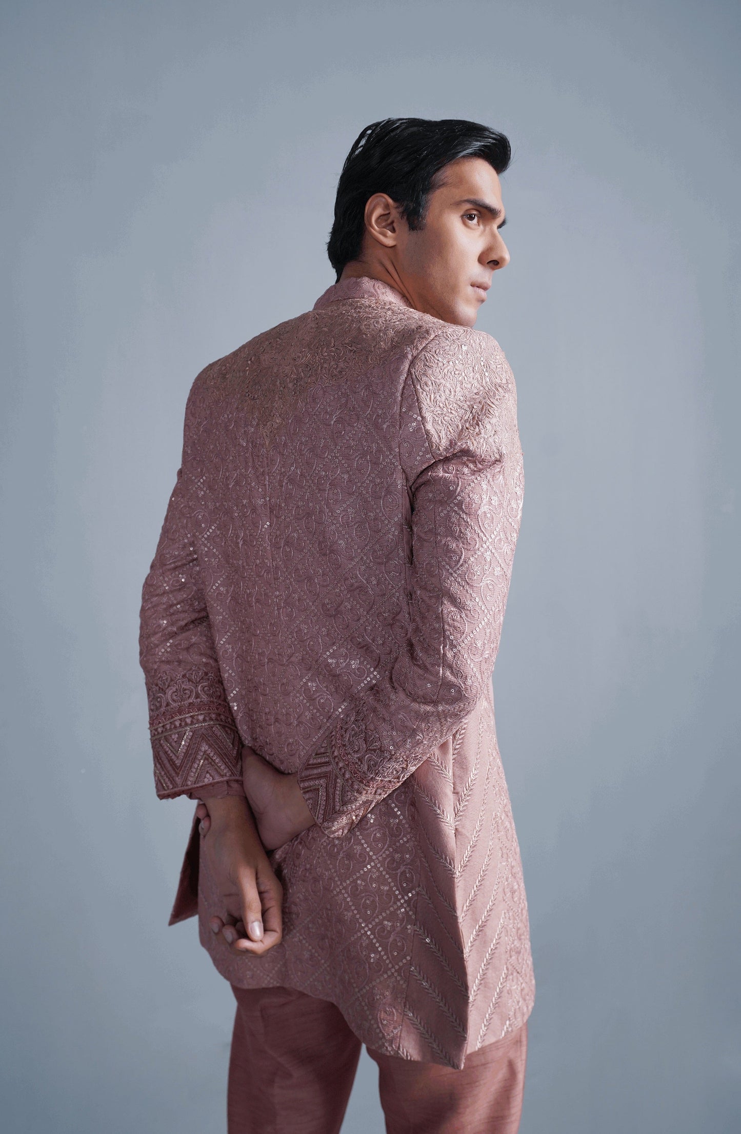 Top sherwanis for grooms by HSY-Traditional ethnic look featuring coral pink cotton net short sherwani set.