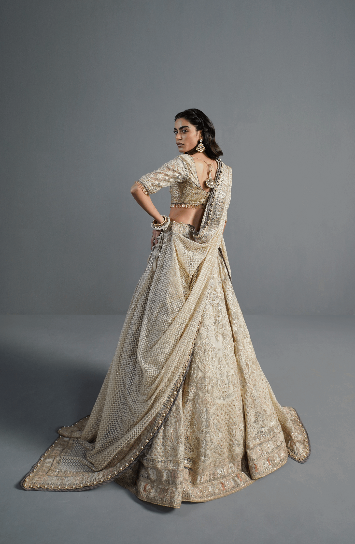 Crème Orchid - Ethereal Lehenga Choli Ensemble-Embroidery details on Crème Orchid ethereal lehenga choli.