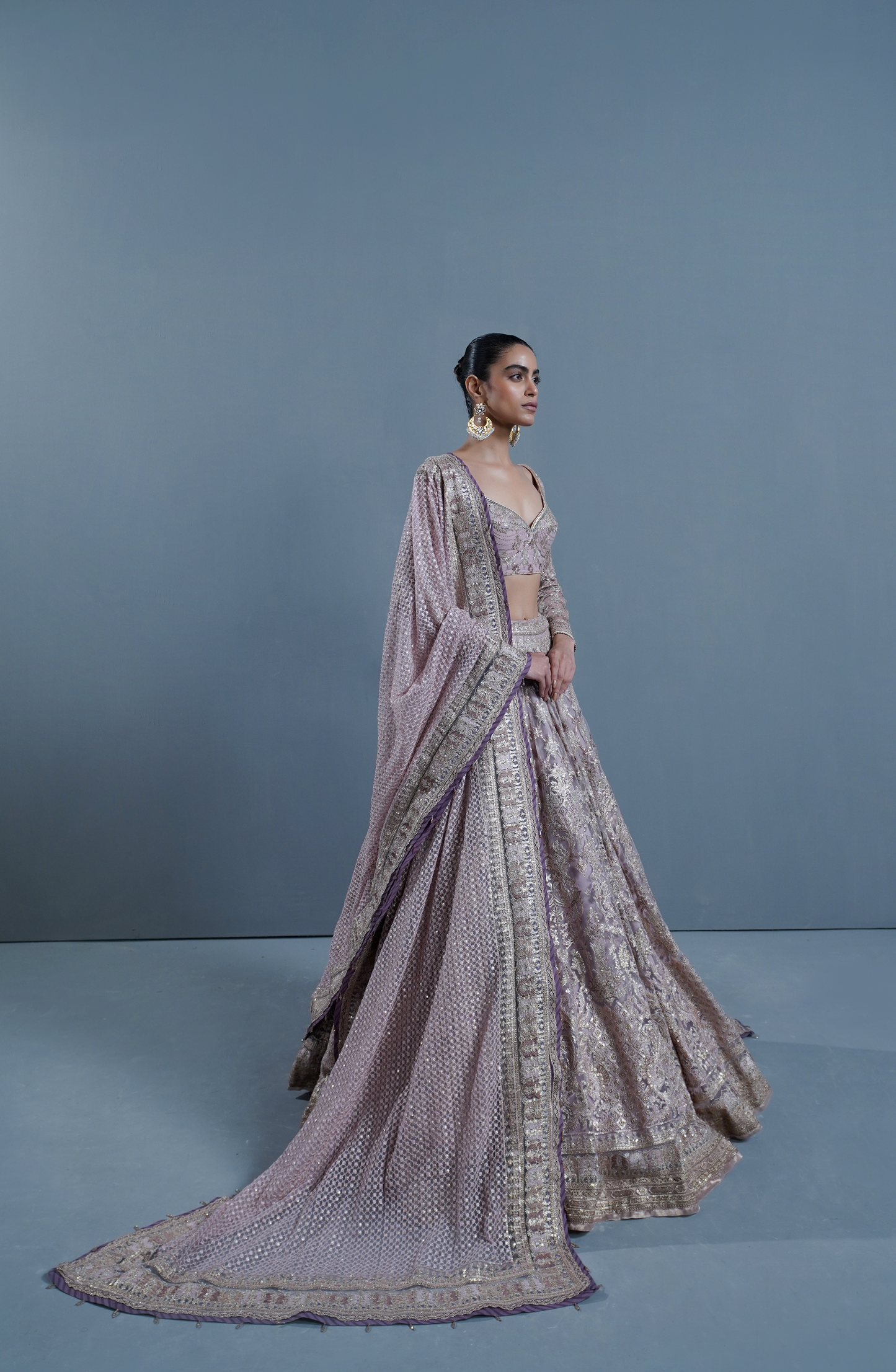 HSY Trousseau wedding Lehenga Choli in USA-Side profile of lavender haze lehenga highlighting graceful drape.