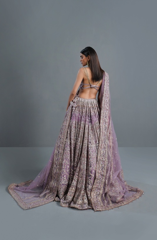 HSY Pakistani designer formal wear.-Back design of blouse from lilac lehenga choli set with elegant detailing.