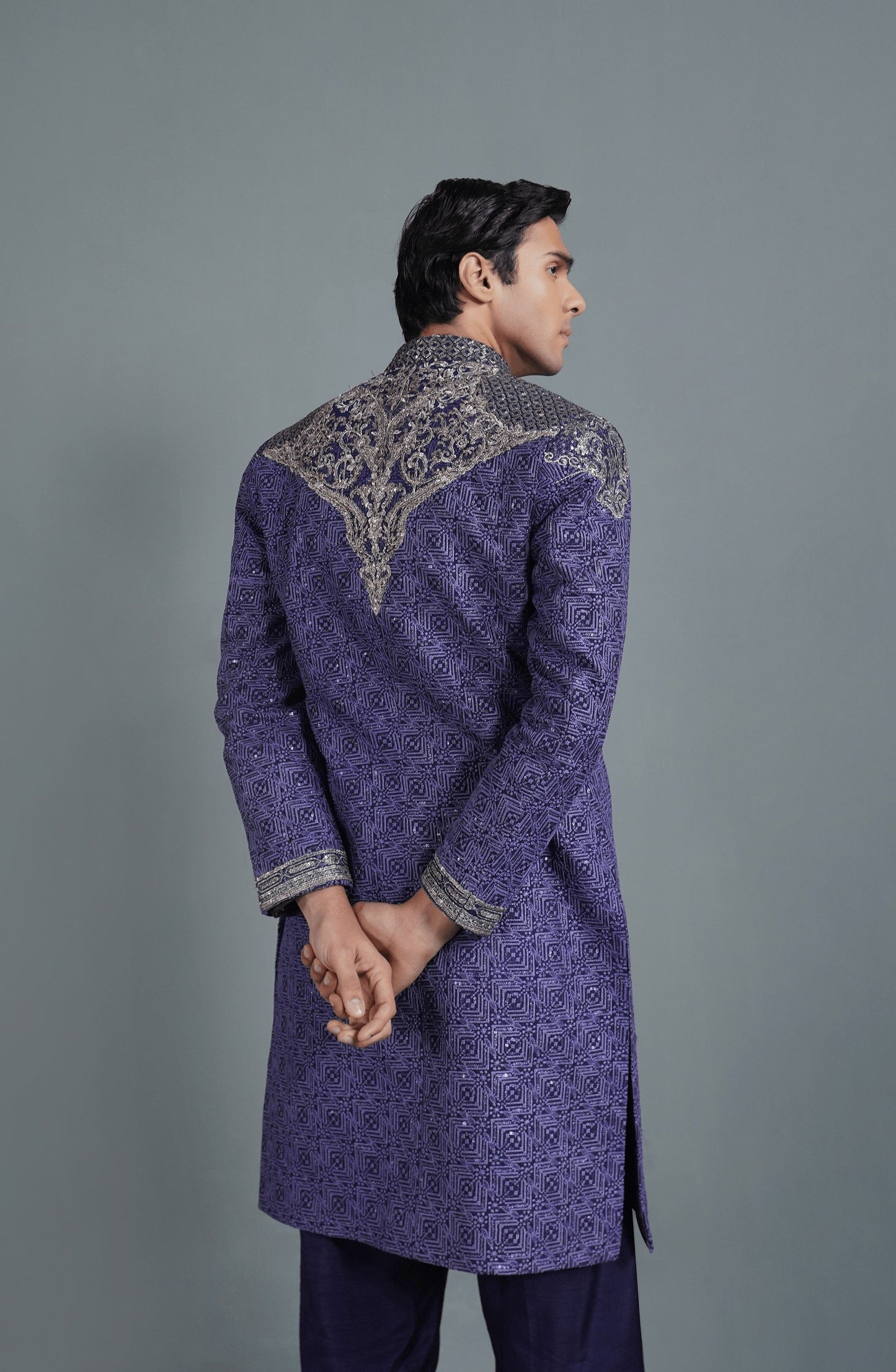 Handcrafted designer sherwanis for weddings-Back design of elegant Midnight Purple silk sherwani outfit
