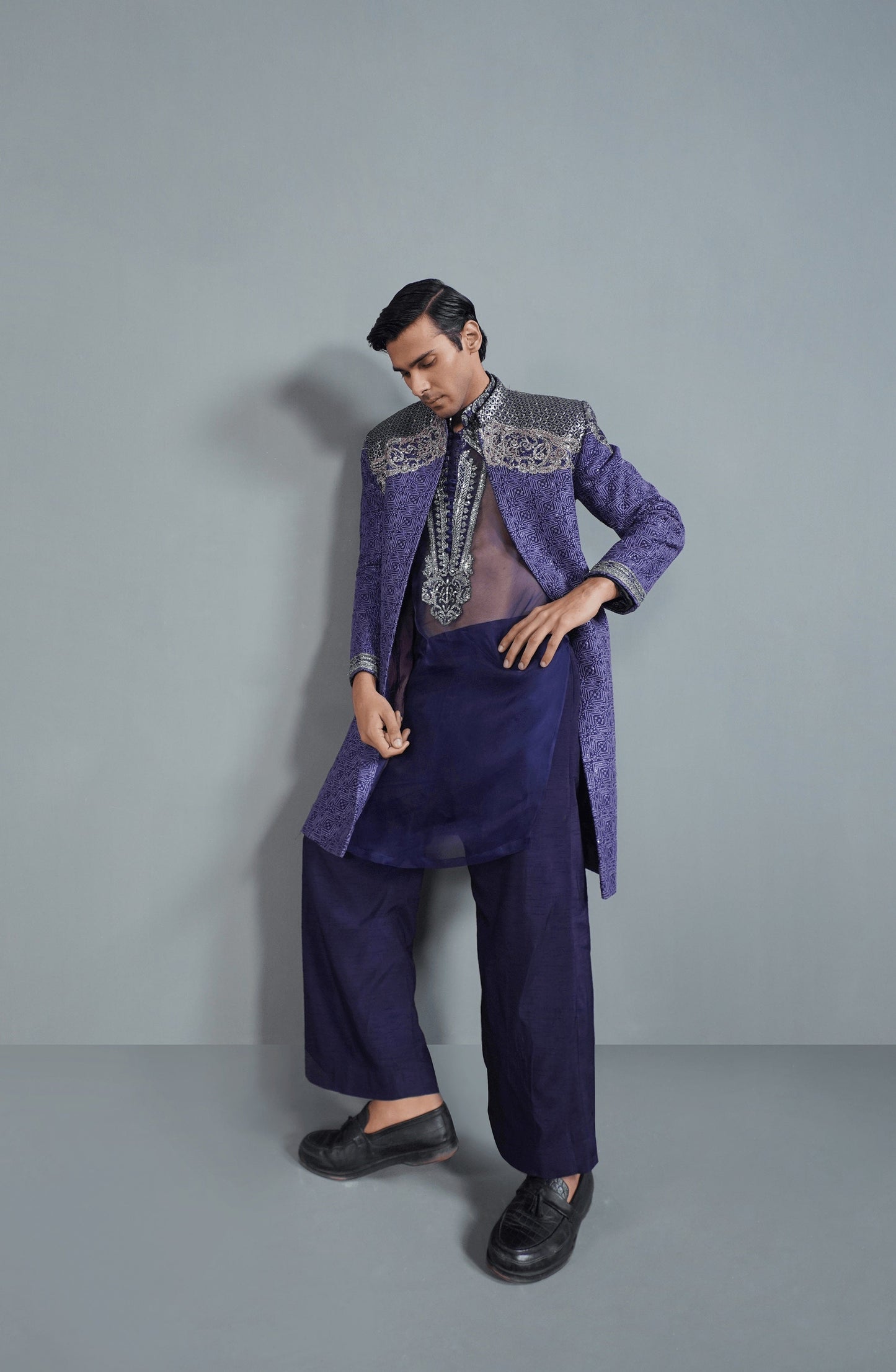 Model styling Midnight Purple silk sherwani set for wedding wear-Browse the finest sherwanis for men