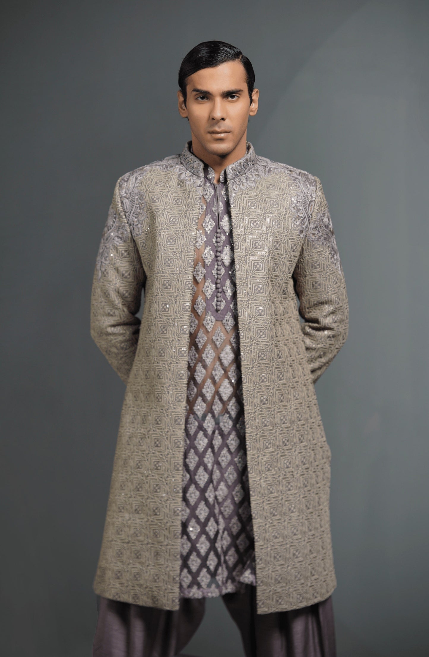 Luxury wedding sherwanis for men-Model wearing Moonlight lilac silk sherwani set for wedding look