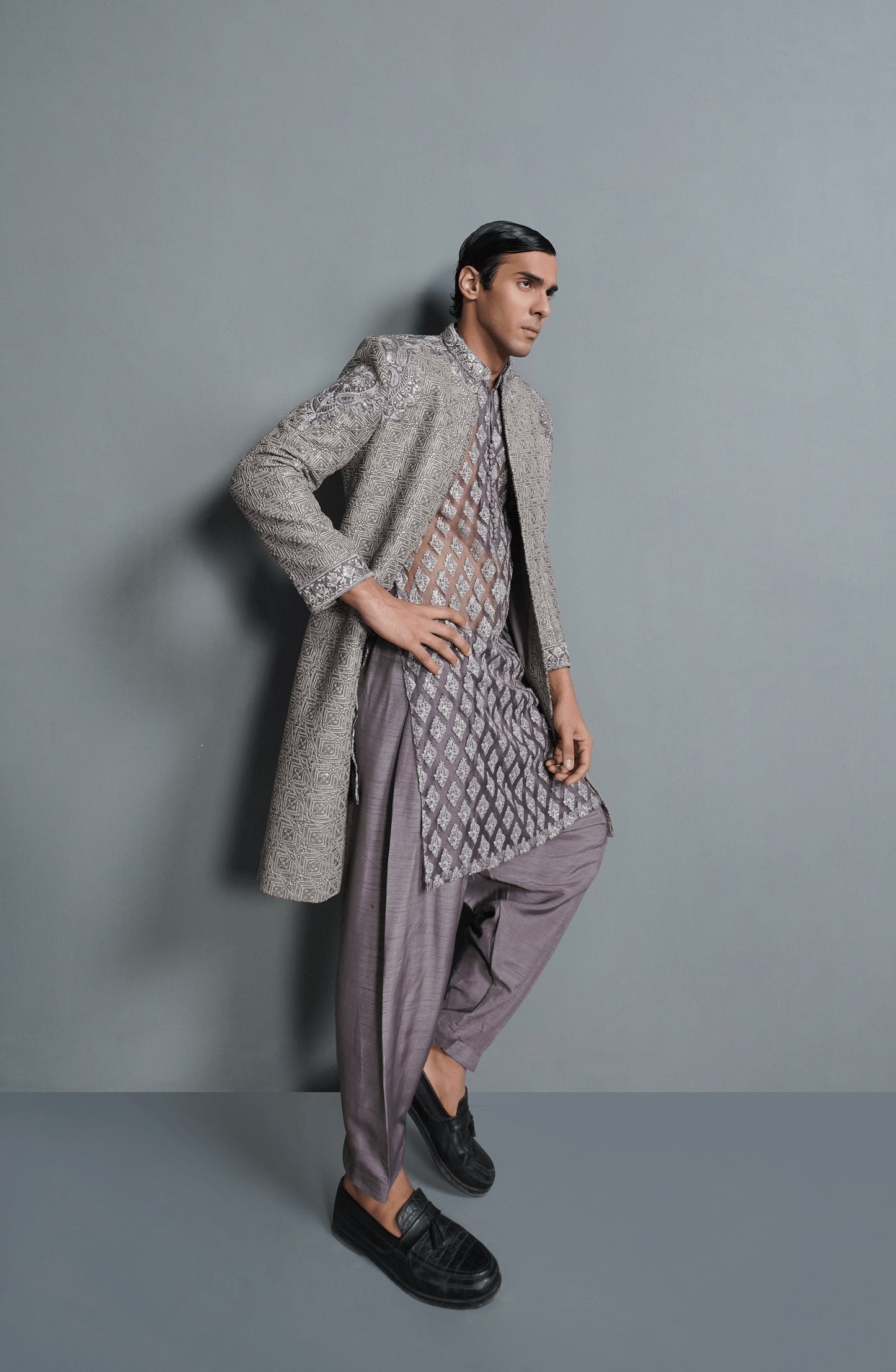 Groom sherwani collections by Trousseau-Side profile of Moonlight elegant lilac sherwani with trousers