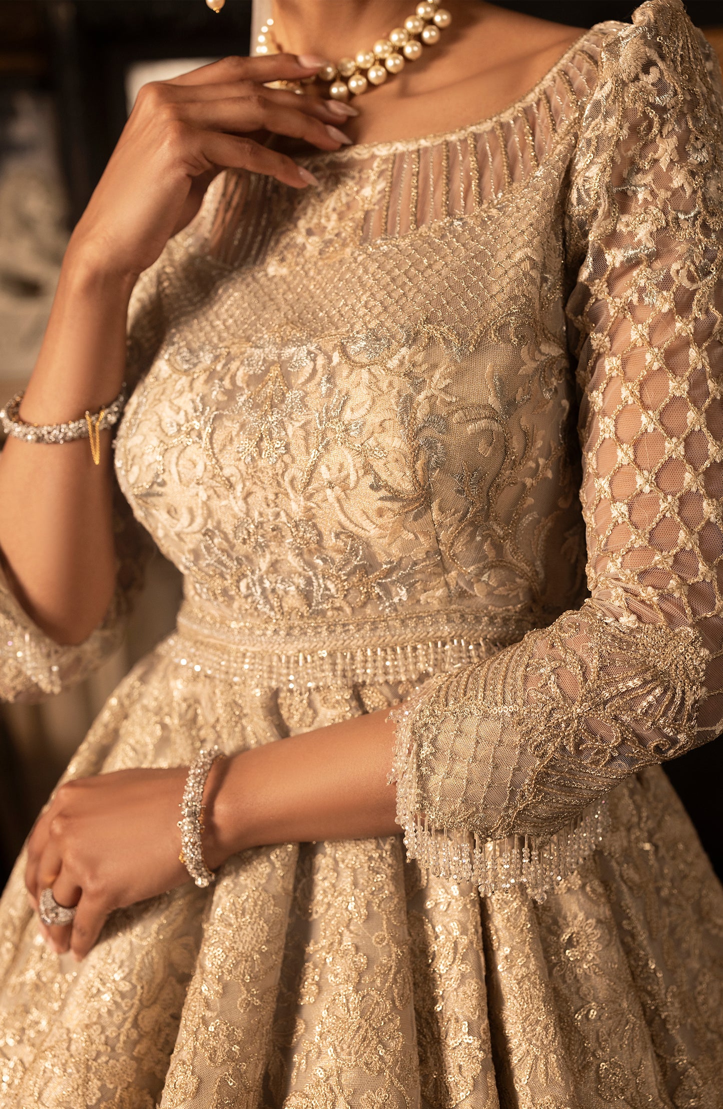 HSY BCW-02 - Net Peplum Lehenga Ensemble-Closeup of embroidery on net peplum lehenga ensemble