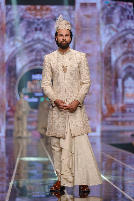 HSY Net Pishwas With Jamawar Sharara-Side profile of net pishwas outfit with embroidered jamawar sharara