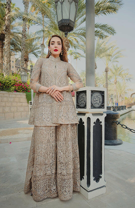 Noor-un-Nisa - Elegance Beige EnsembleElegant Noor-un-Nisa beige ensemble with delicate embroidery, front design.