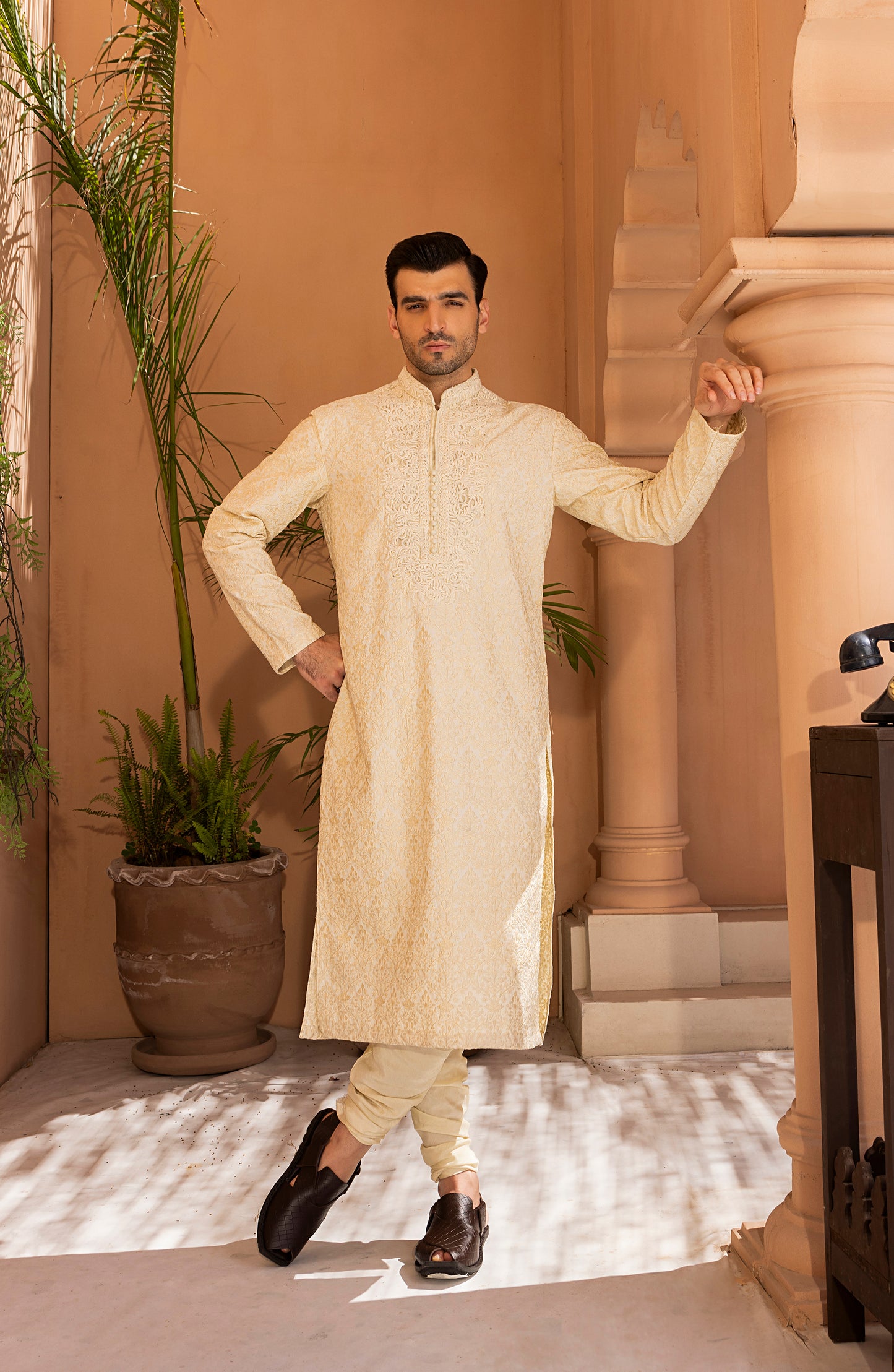 Sleeve embroidery detail on pearl white embroidered kurta set