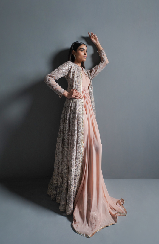 HSY Trousseau Luxury Formals gown women in USA-Side profile of Pink Haze outfit highlighting graceful drape and jacket style.