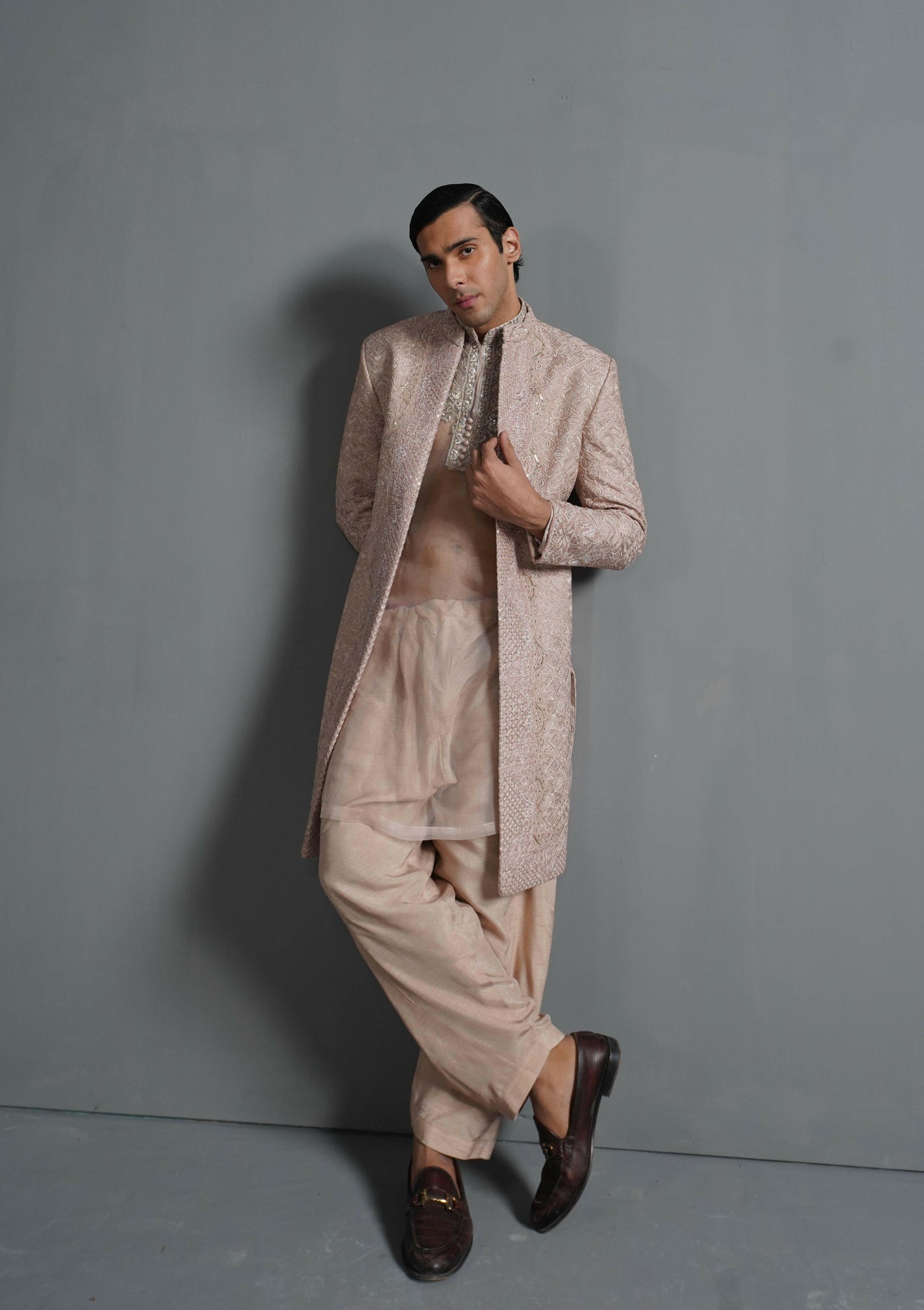 HSY Designer sherwani for Groom in USA-Traditional ethnic look styled in primrose pink embroidered sherwani for weddings.