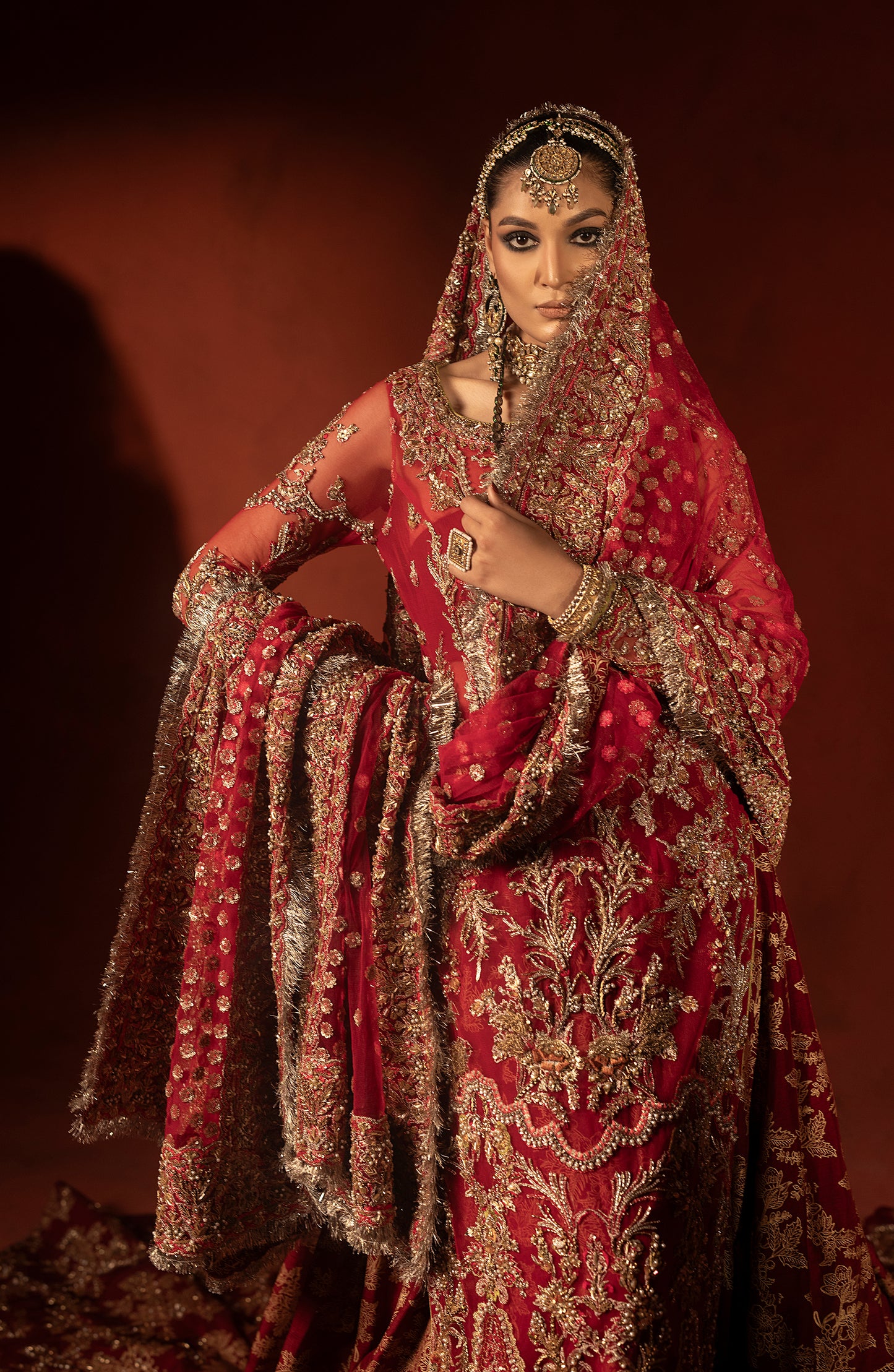Full view of raspberry red bridal trail lehenga blouse