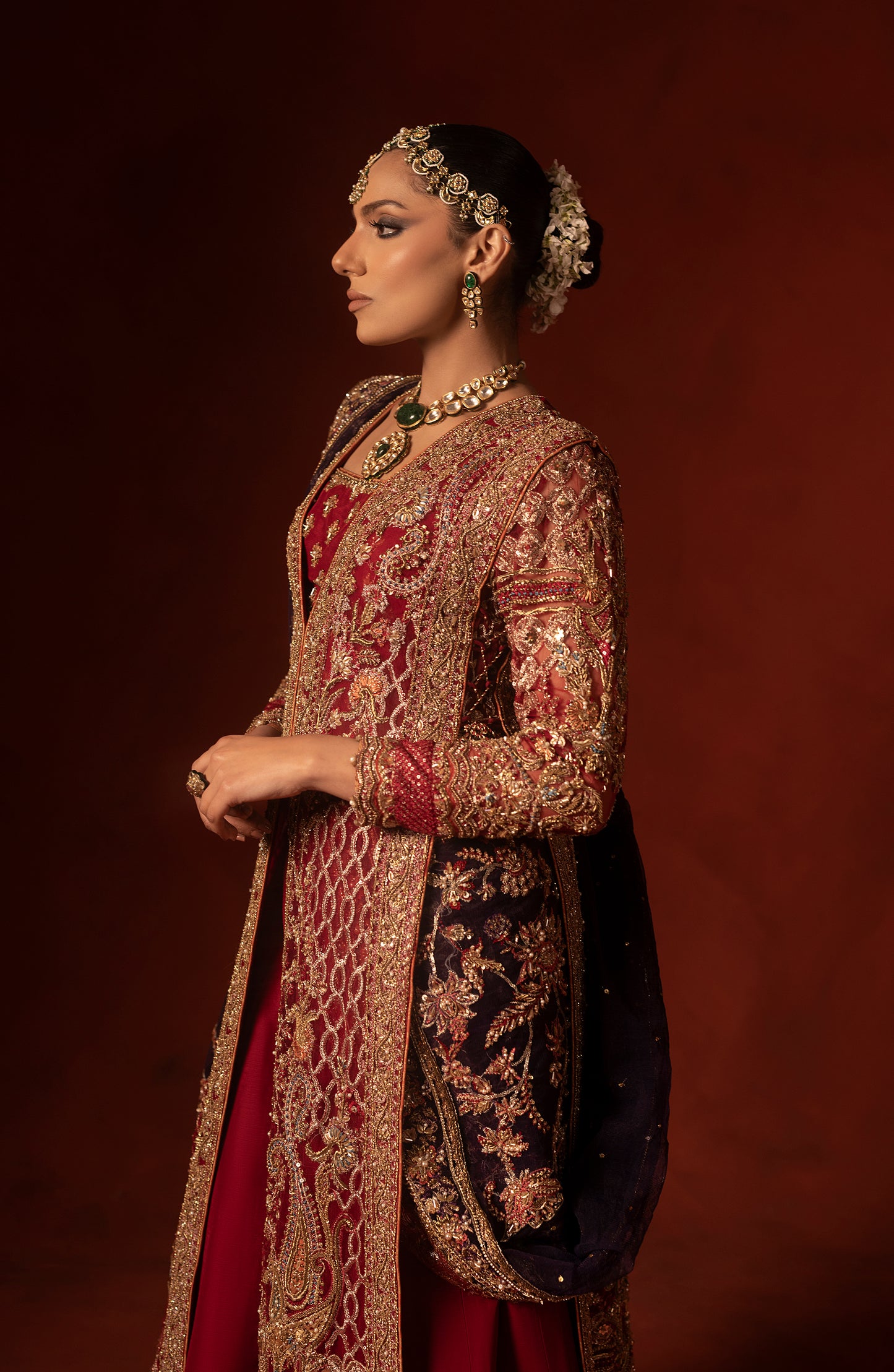 Embroidery detail on red shirt with azaar pants set
