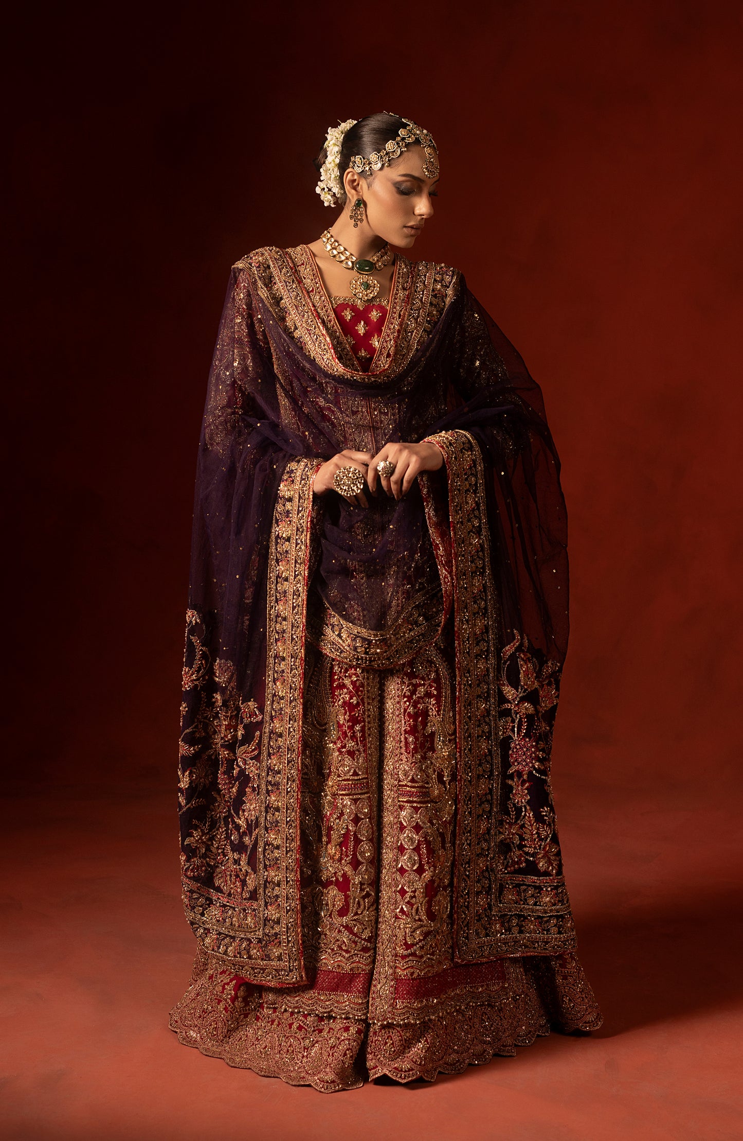 Model showcasing red front open shirt with azaar pants