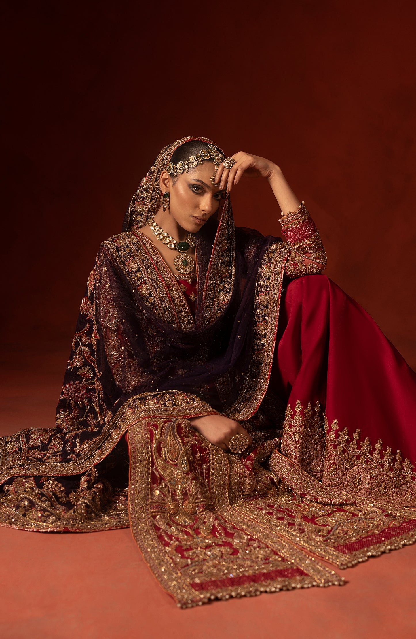 Modern ethnic fashion red shirt paired with azaar pants