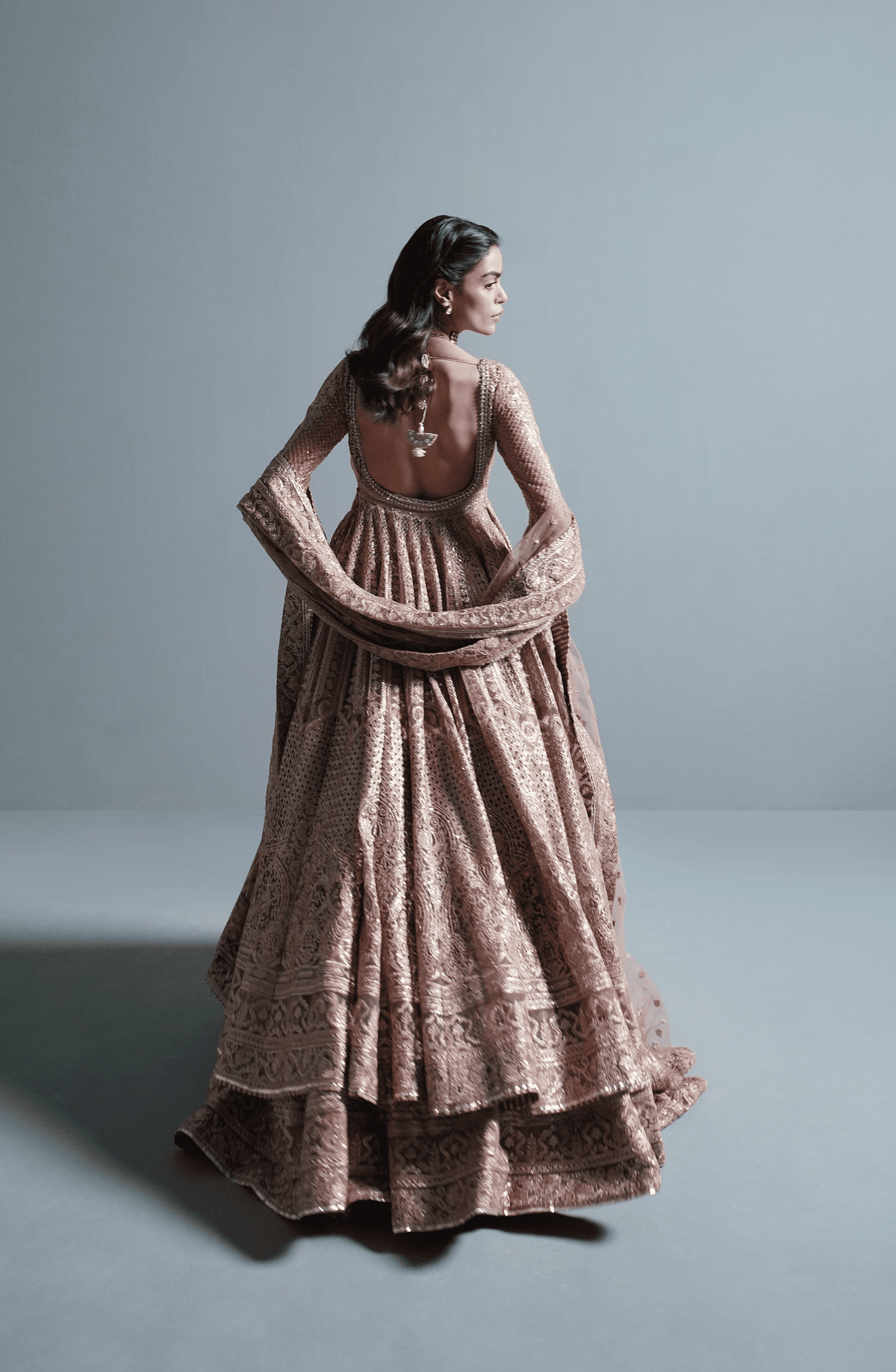 Indian wedding dresses USA-Back design of Rose Gold embroidered pishwas lehenga outfit