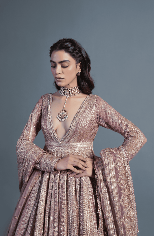 Indian wedding dresses USA-Closeup detailing on Rose Gold embroidered pishwas lehenga set