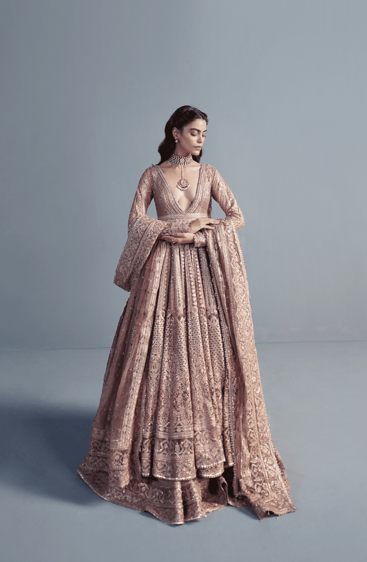 Indian wedding dresses USA-Front view of Rose Gold embroidered pishwas lehenga bridal set