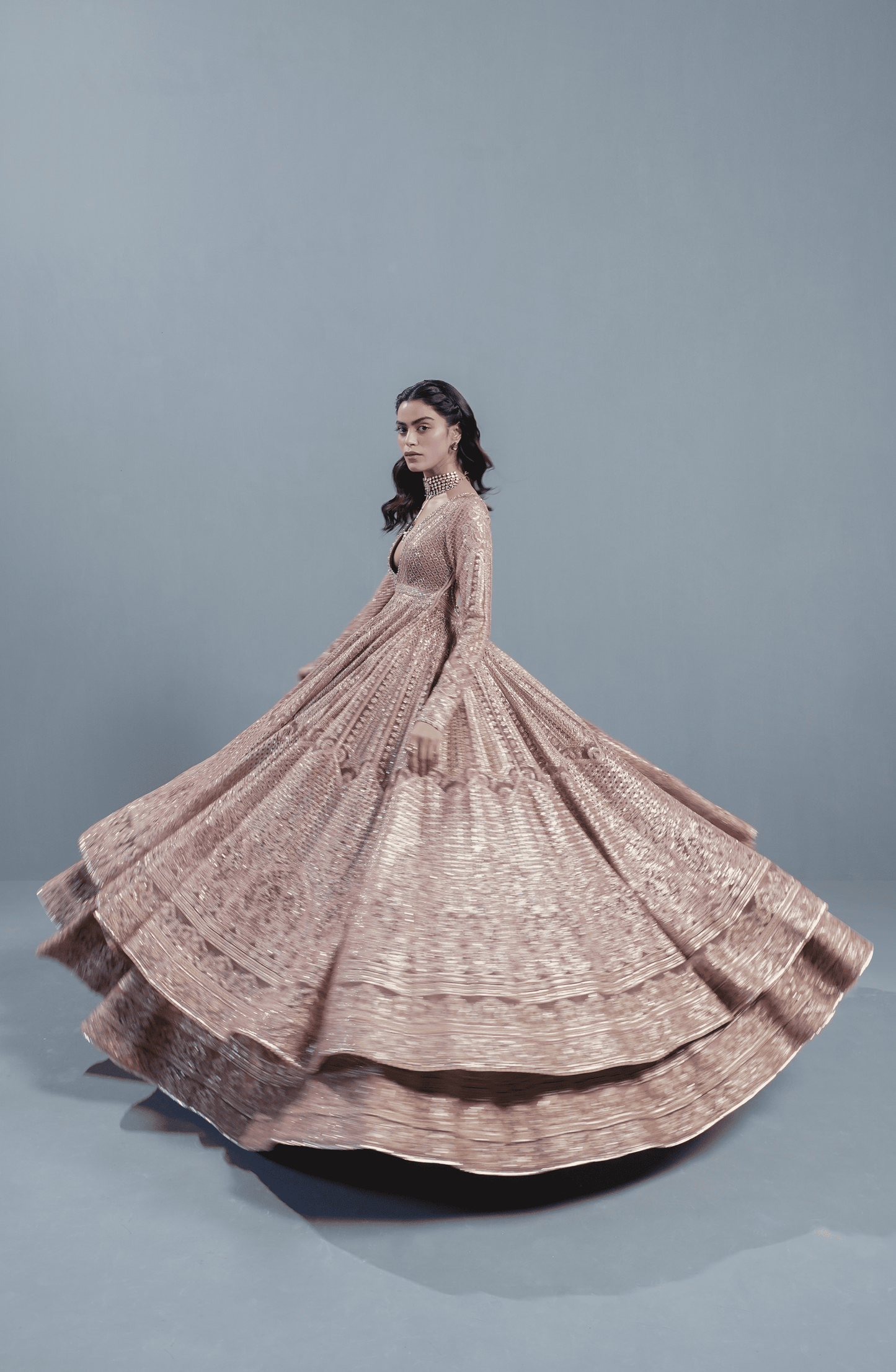 Indian wedding dresses USA-Model styling Rose Gold embroidered pishwas lehenga set