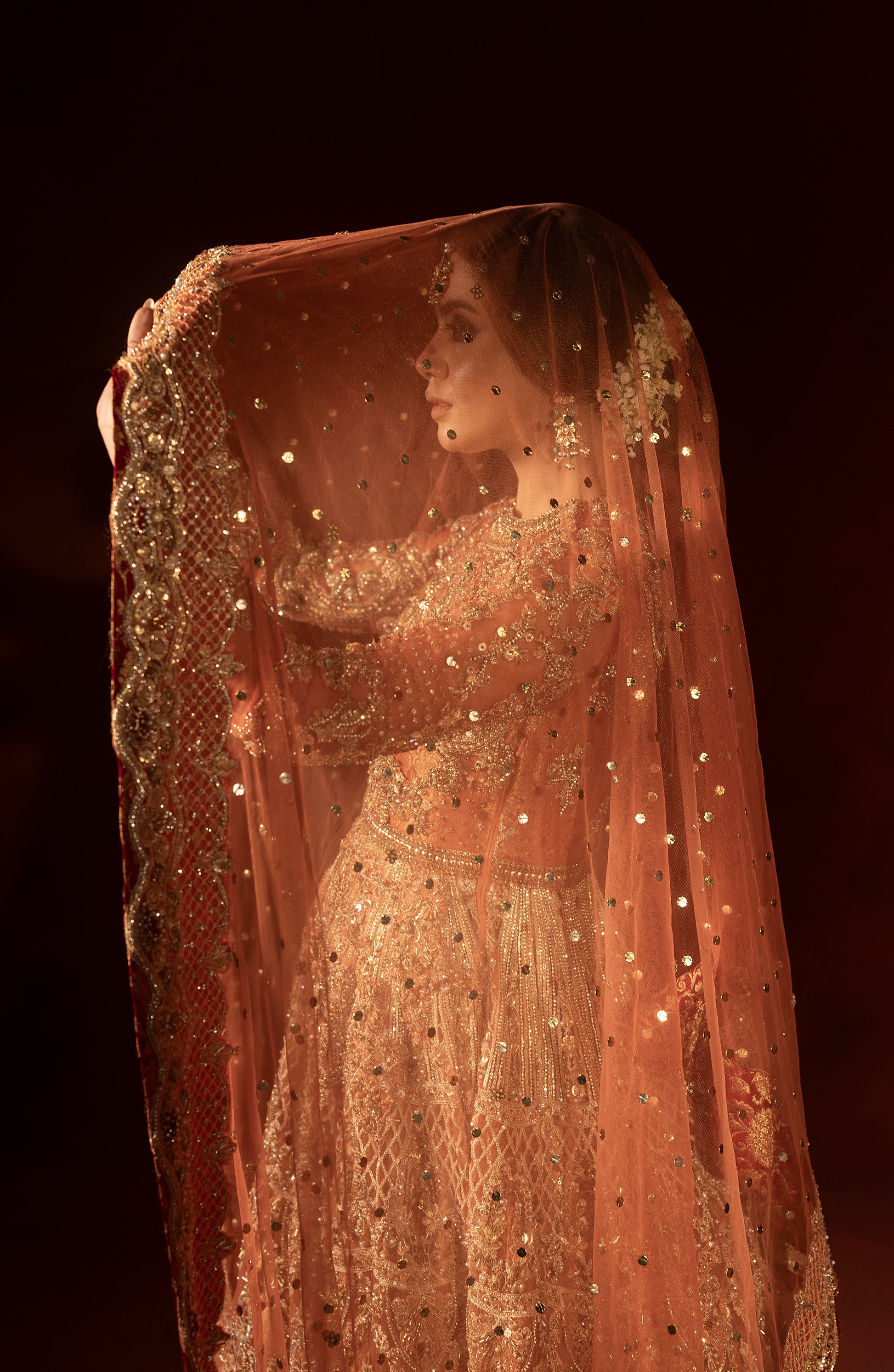 Flare view of rust orange pishwas and jamawar lehenga set