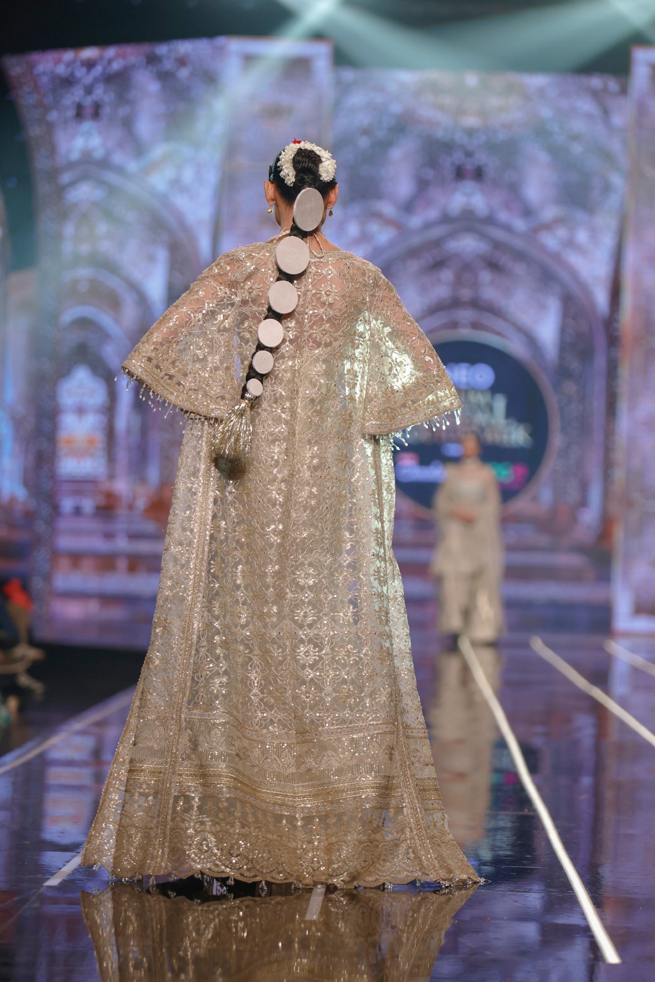 HSY Skirt & Halter Blouse Net Ensemble With Jacket-Back design of net skirt paired with halter blouse and jacket