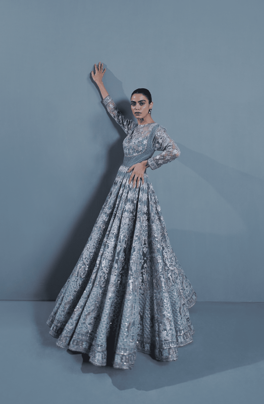 Side profile of elegant Star Dust embroidered pishwas dress