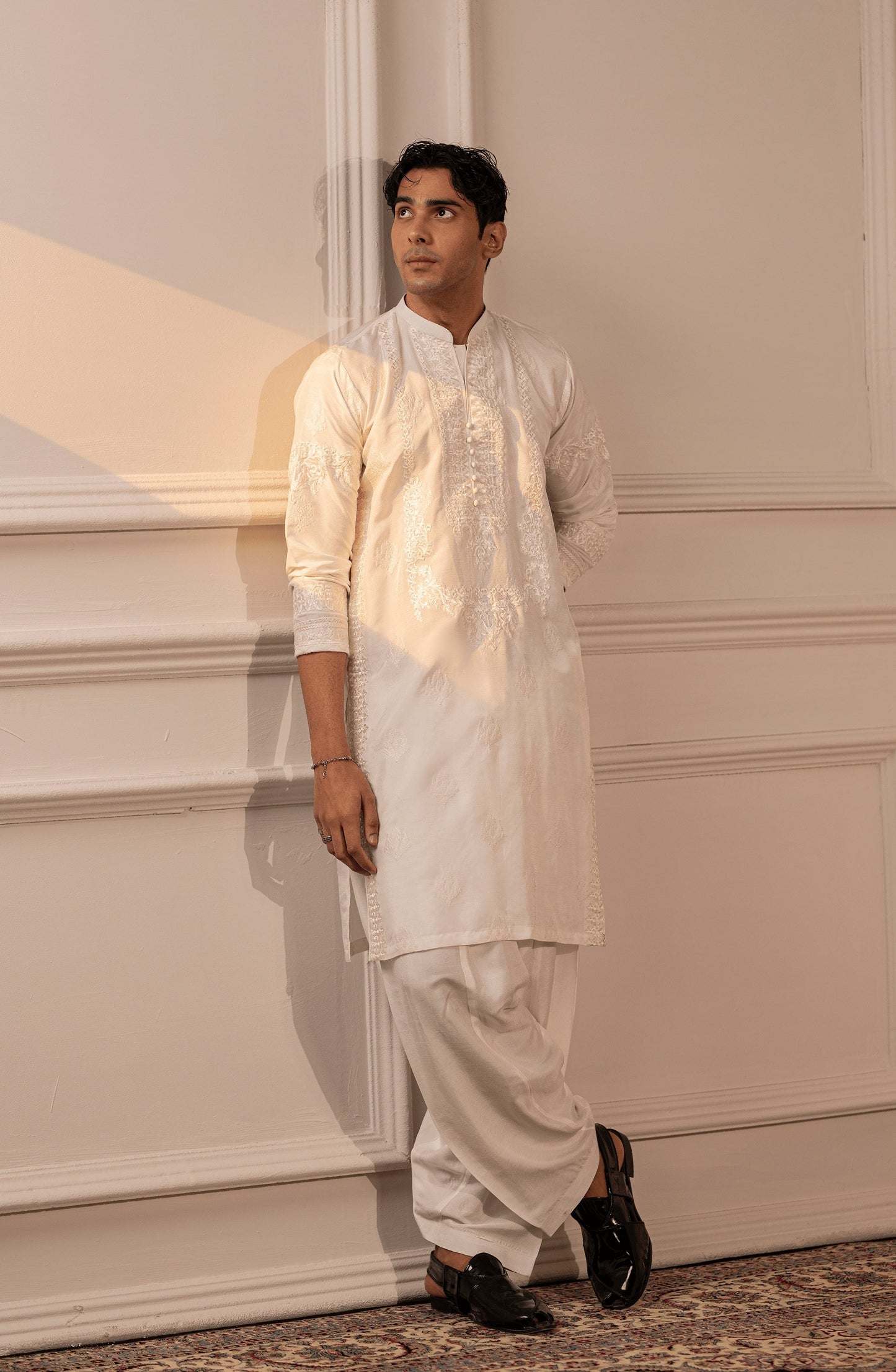 Affordable men’s kurtas with traditional flair-Neckline embroidery detail of Timeless White silk kurta for men.