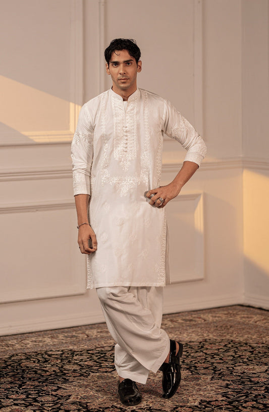 Buy traditional Pakistani kurta for men online-Side profile of Timeless White embroidered silk kurta shalwar for men.