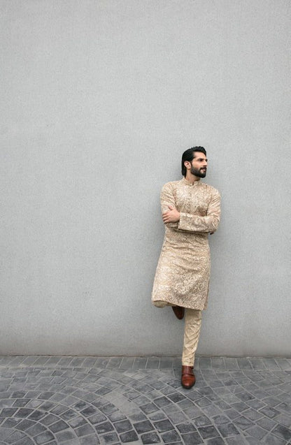Hand Embroidered Kurta paired with Raw Silk Trousers