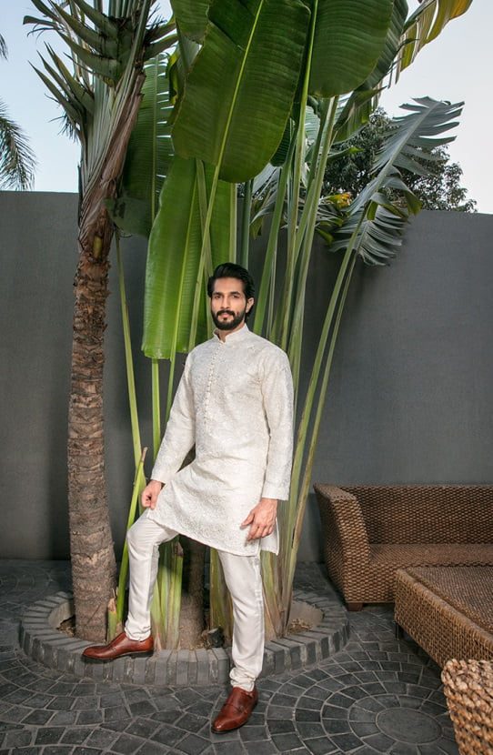 Embroidered Traditional Kurta Paired with Raw Silk Pants