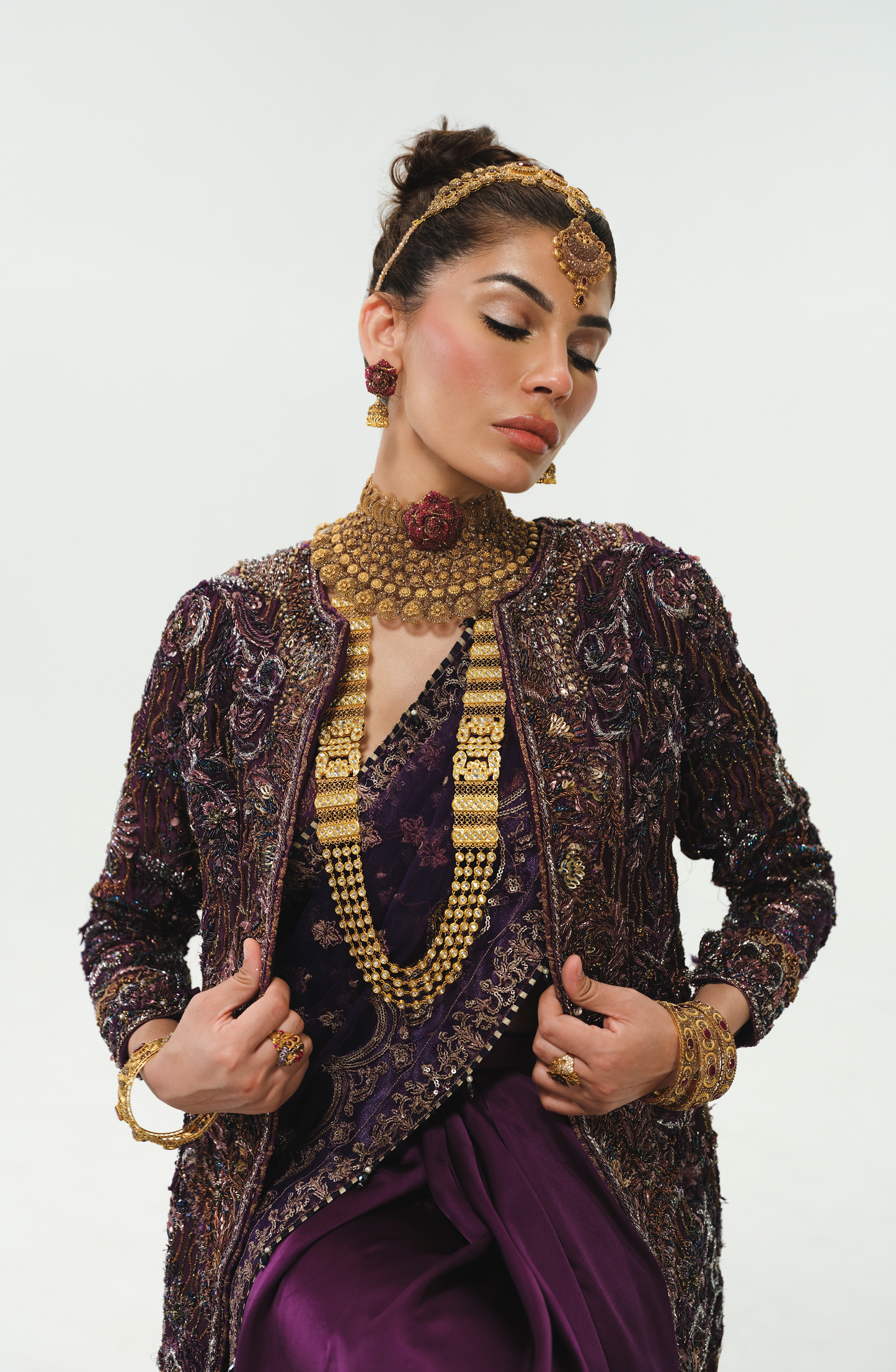 Amna Baber in aubergine purple ensemble.