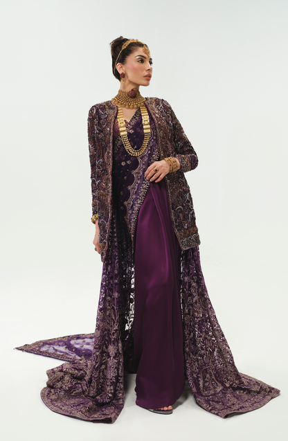 Amna Baber in aubergine purple ensemble.