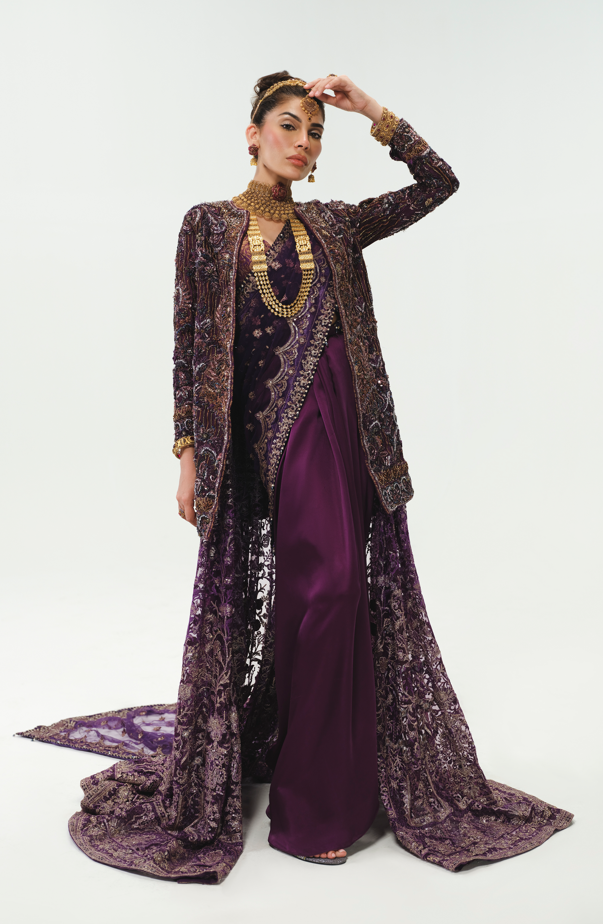 Amna Baber in aubergine purple ensemble.