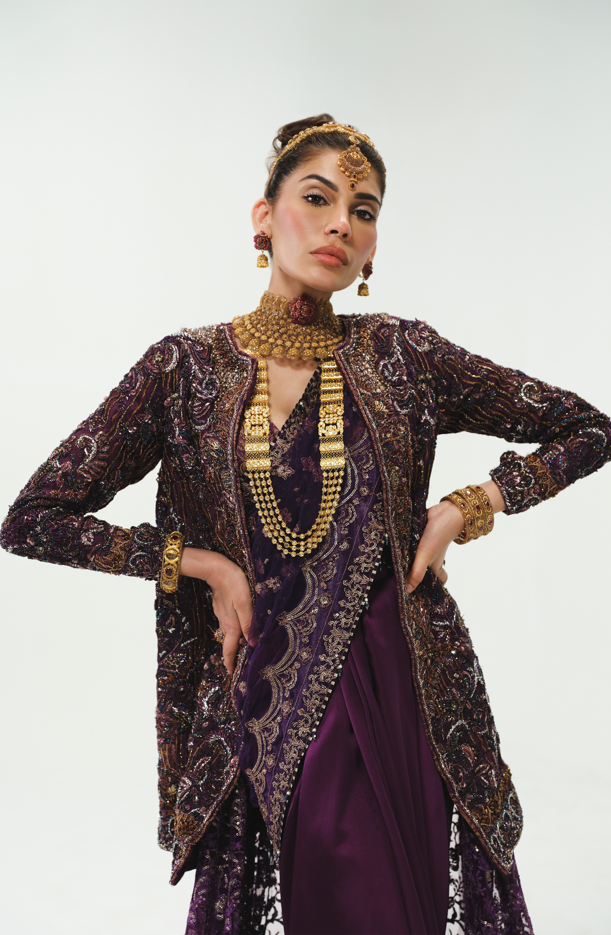 Amna Baber in aubergine purple ensemble.