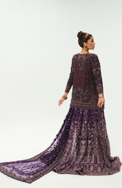 Amna Baber in aubergine purple ensemble.